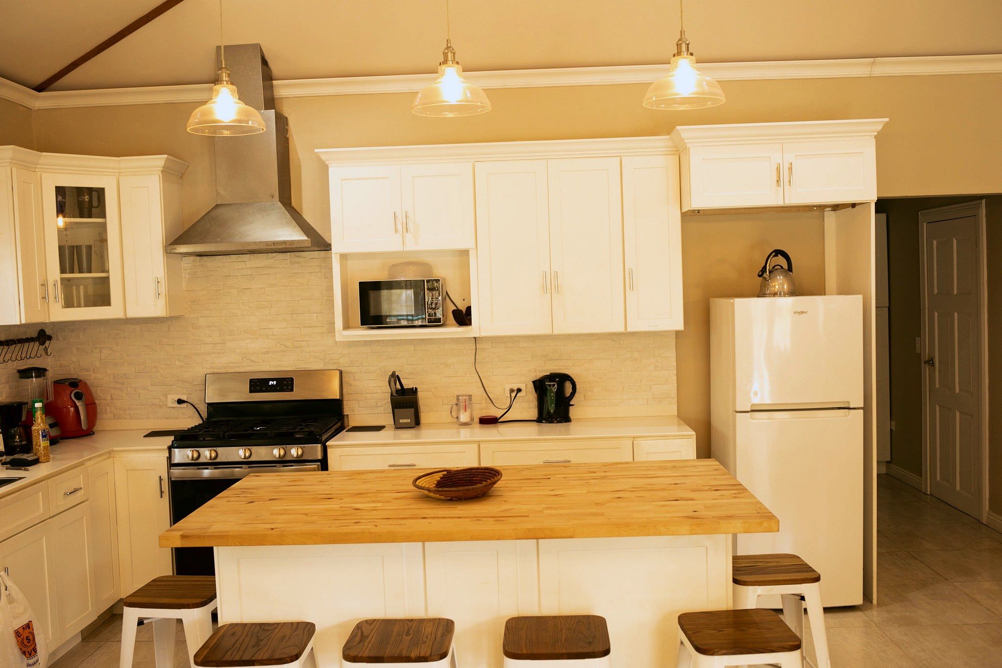 Kitchen island with white cabinets