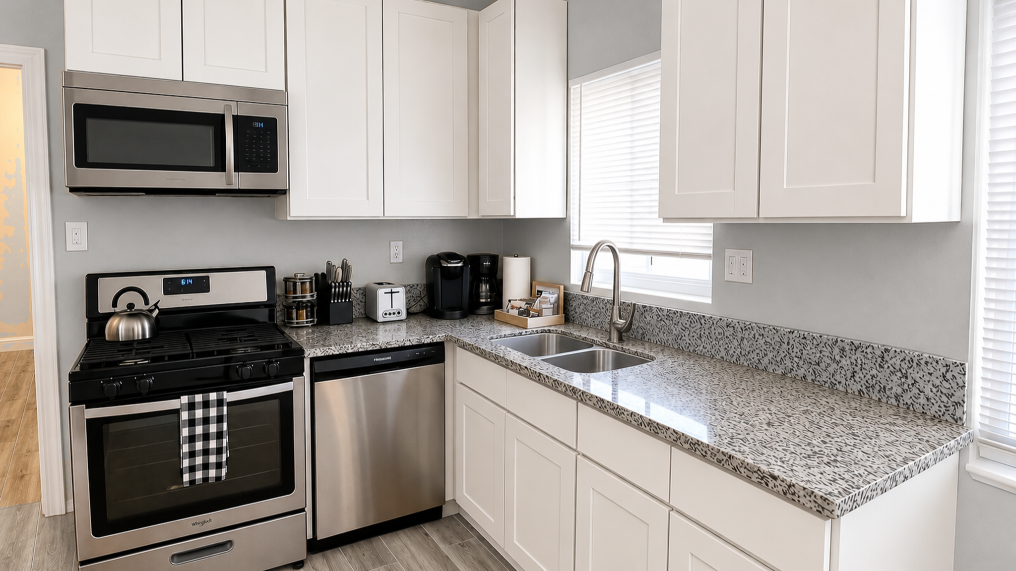 Bright modern kitchen with stainless appliances and ample counter space