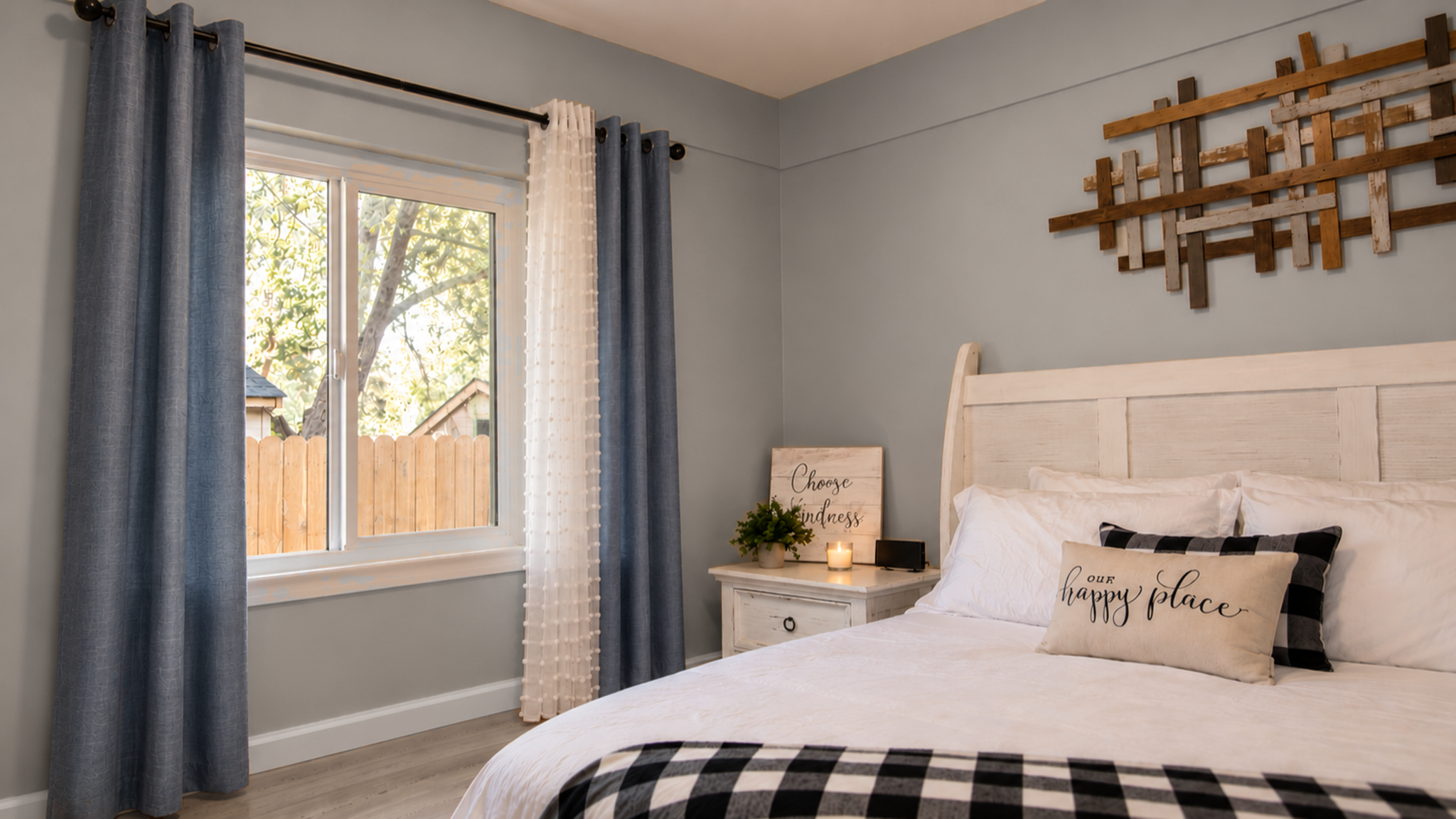 Bright, cozy bedroom with natural light and stylish rustic touches