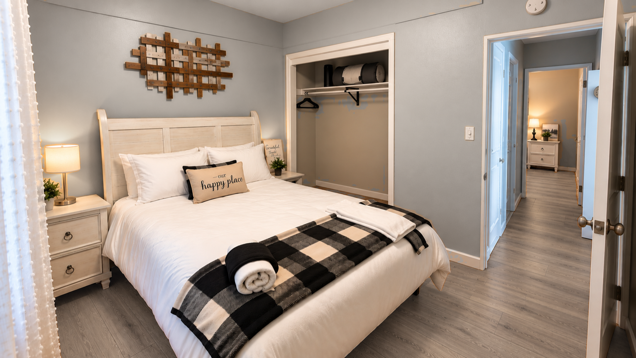 Cozy, bright bedroom with open closet and stylish modern touches