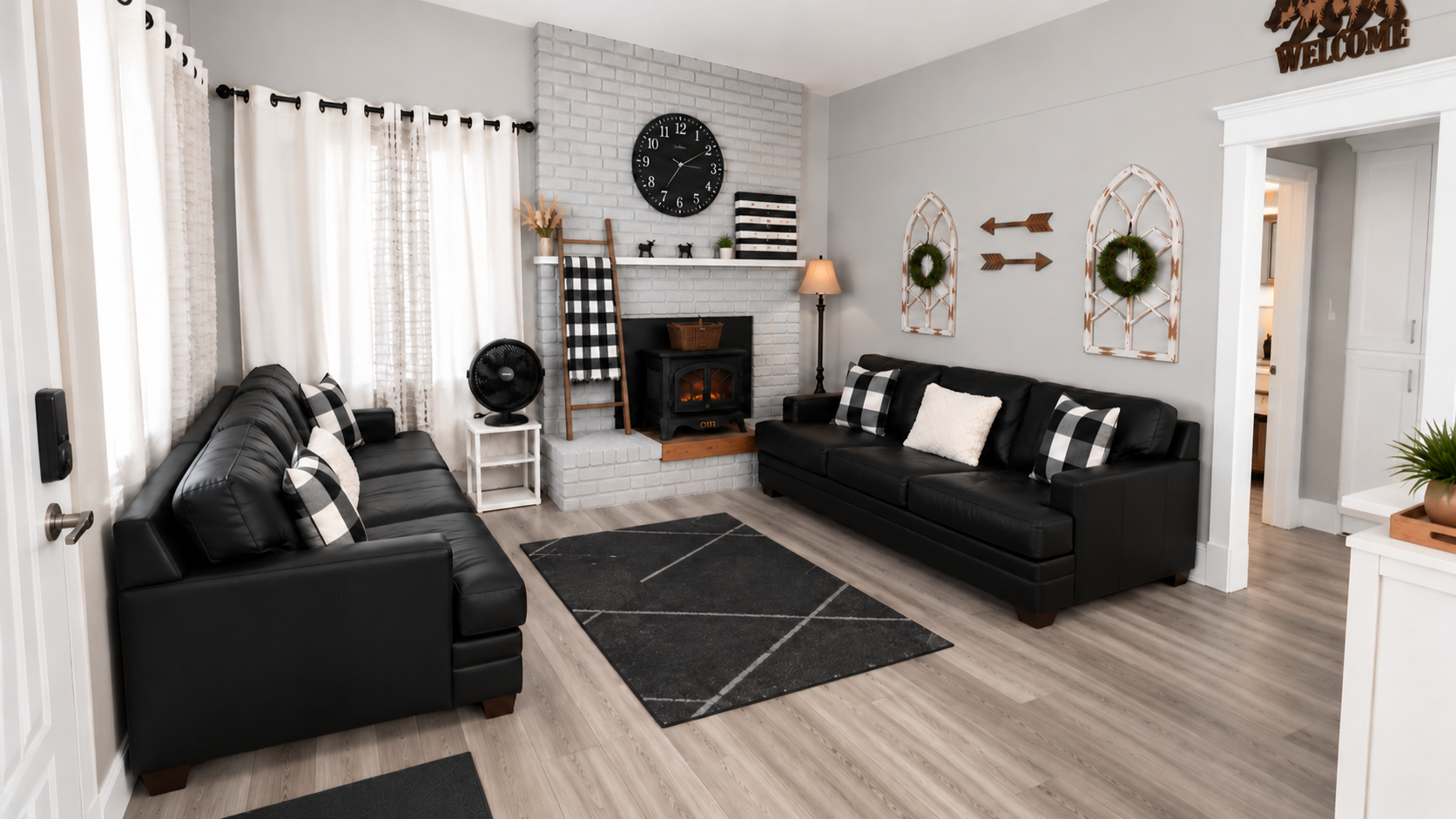 Cozy farmhouse-style living room with fireplace and stylish seating