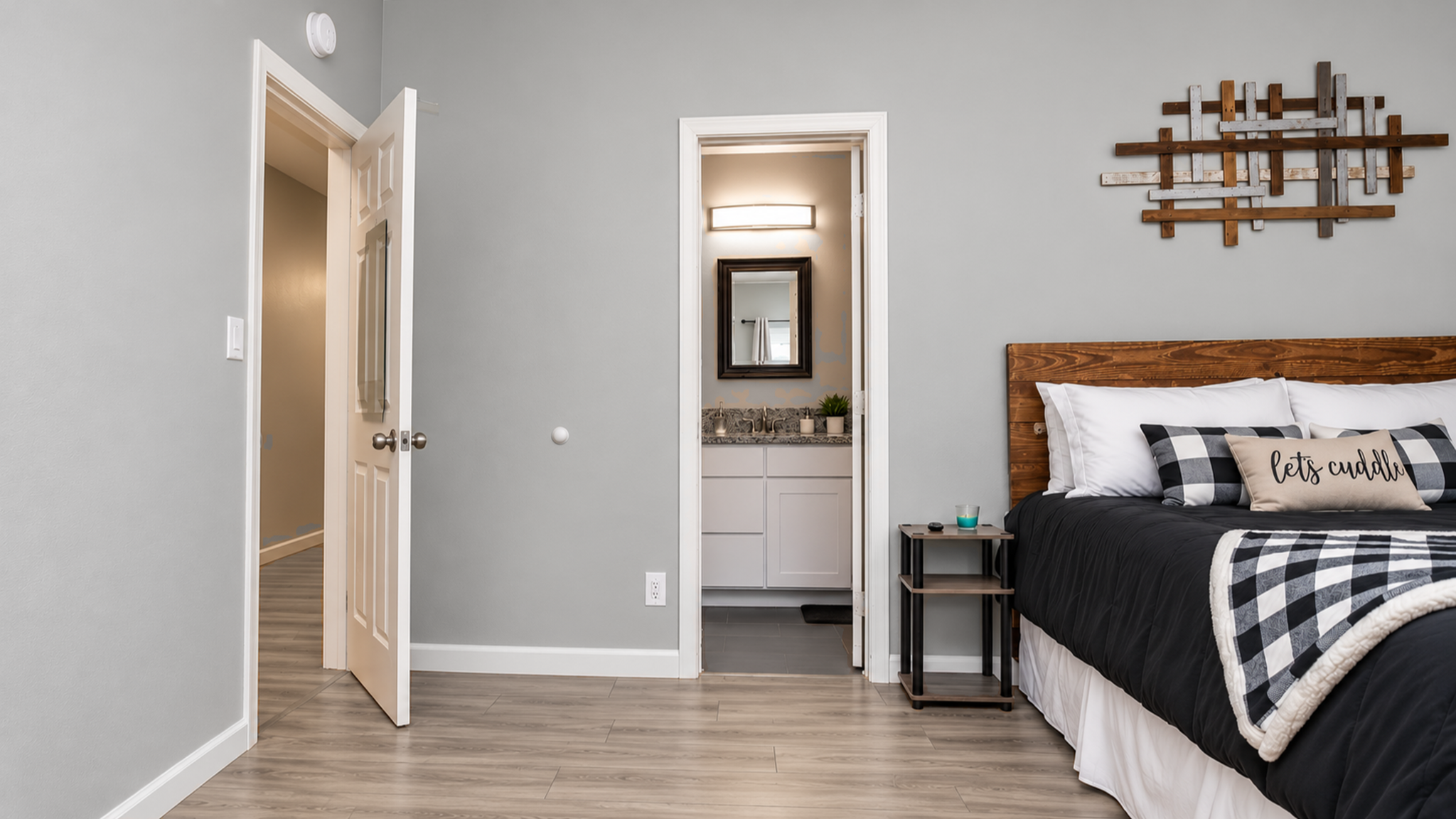 Cozy modern bedroom with private bath access and stylish finishes