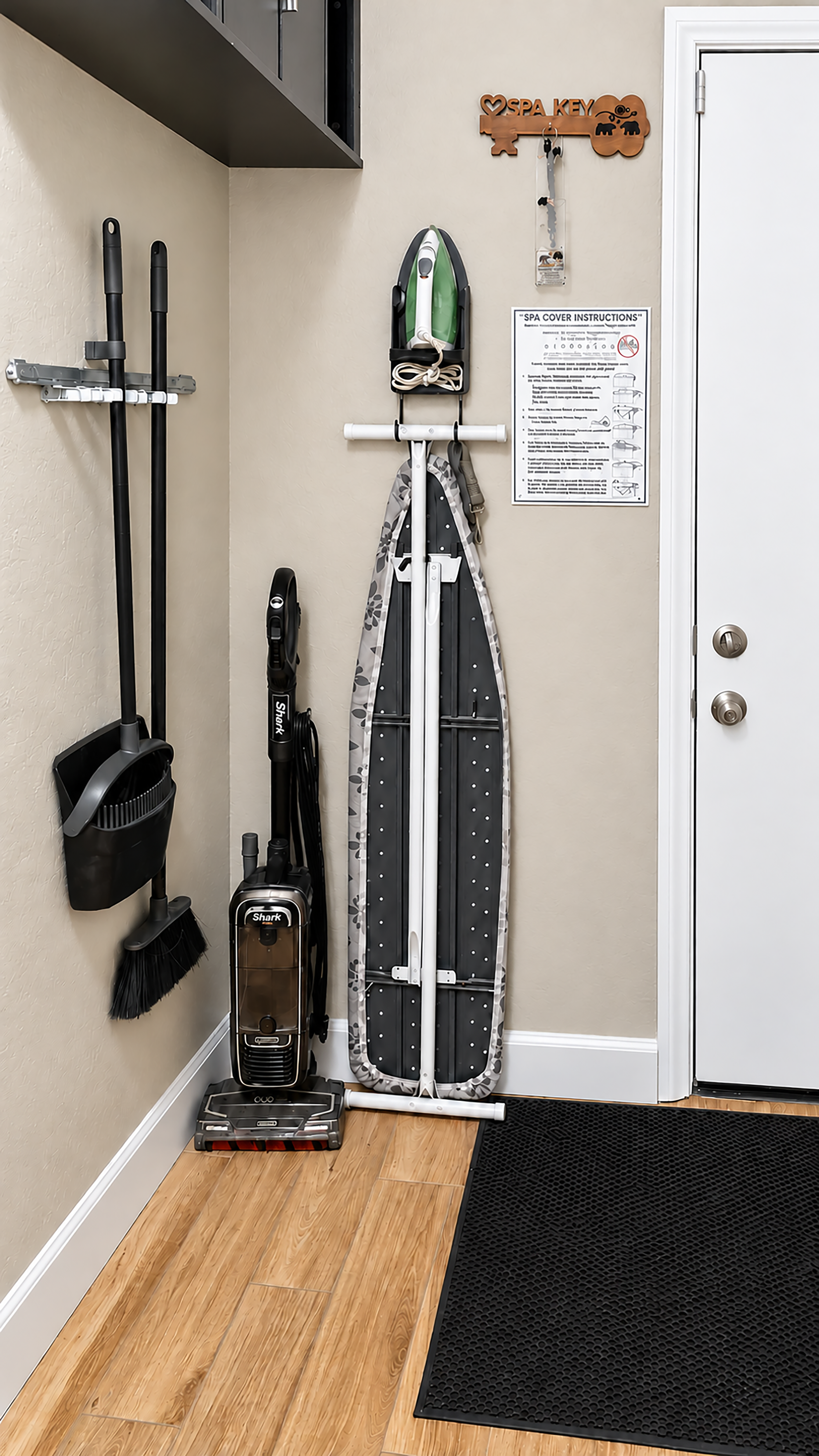 Conveniently tucked away at the end of the hallway, this thoughtfully organized nook provides easy access to the spa, along with a vacuum and ironing essentials to keep everything neat and comfortable throughout your stay.