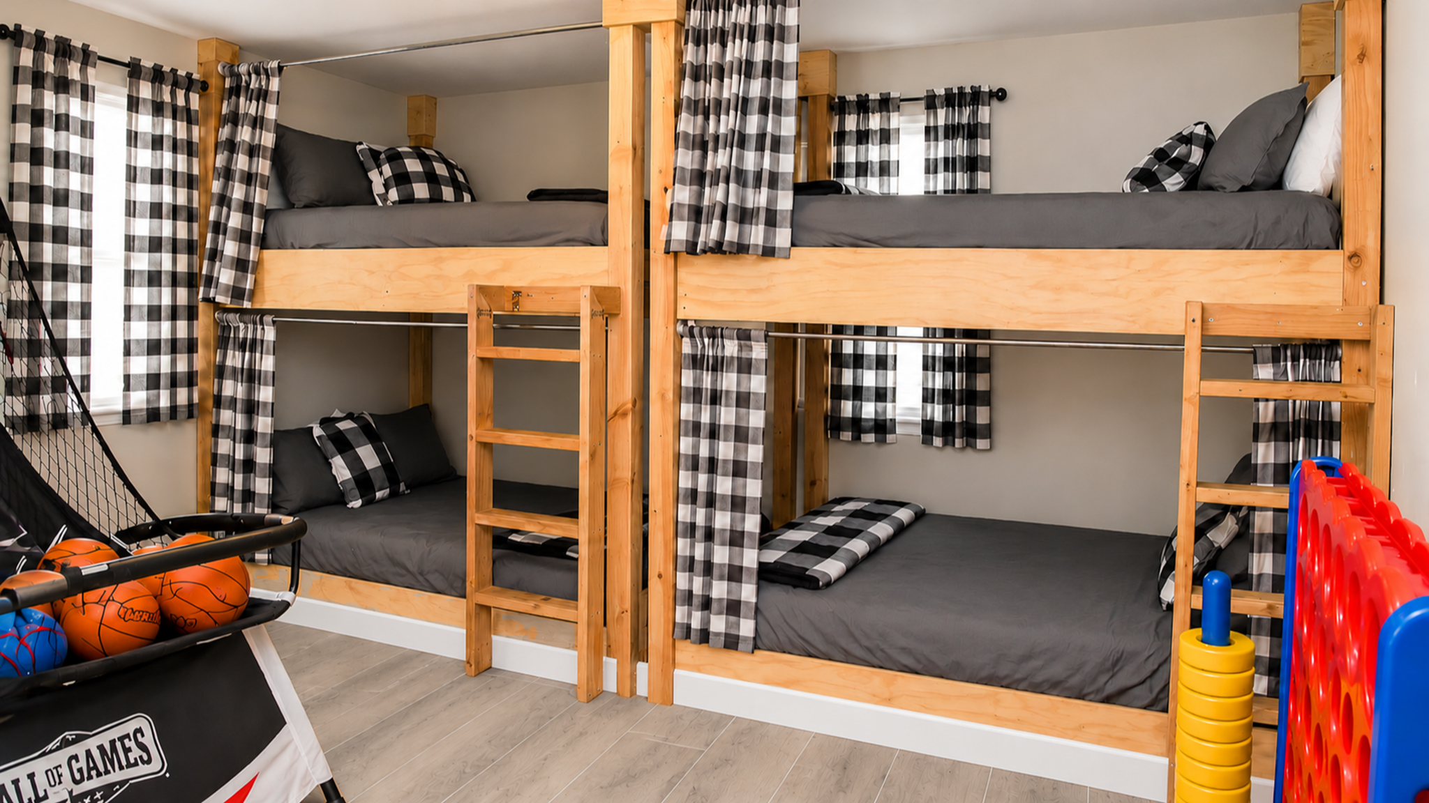 Fun bunk room with privacy curtains and games for the whole group