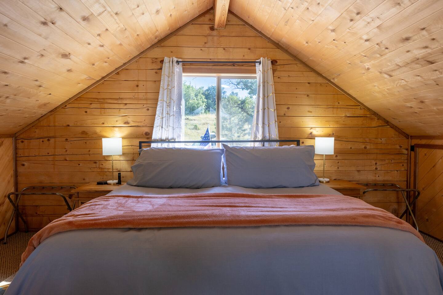 This is a brand new King bed, mattress, featherbed, bedding and pillows. A super comfortable place to rest your head with an incredible view!
