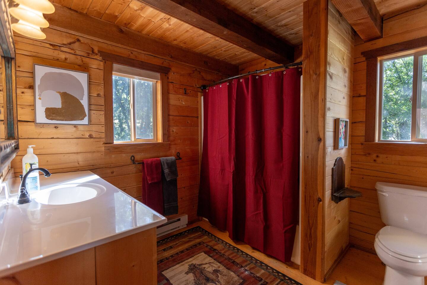 The bathroom has all of the modern conveniences and products you're used to, including Ginger Lily Farms shampoo, conditioner and body wash along with a hair dryer. All the towels you'll need are provided as well.