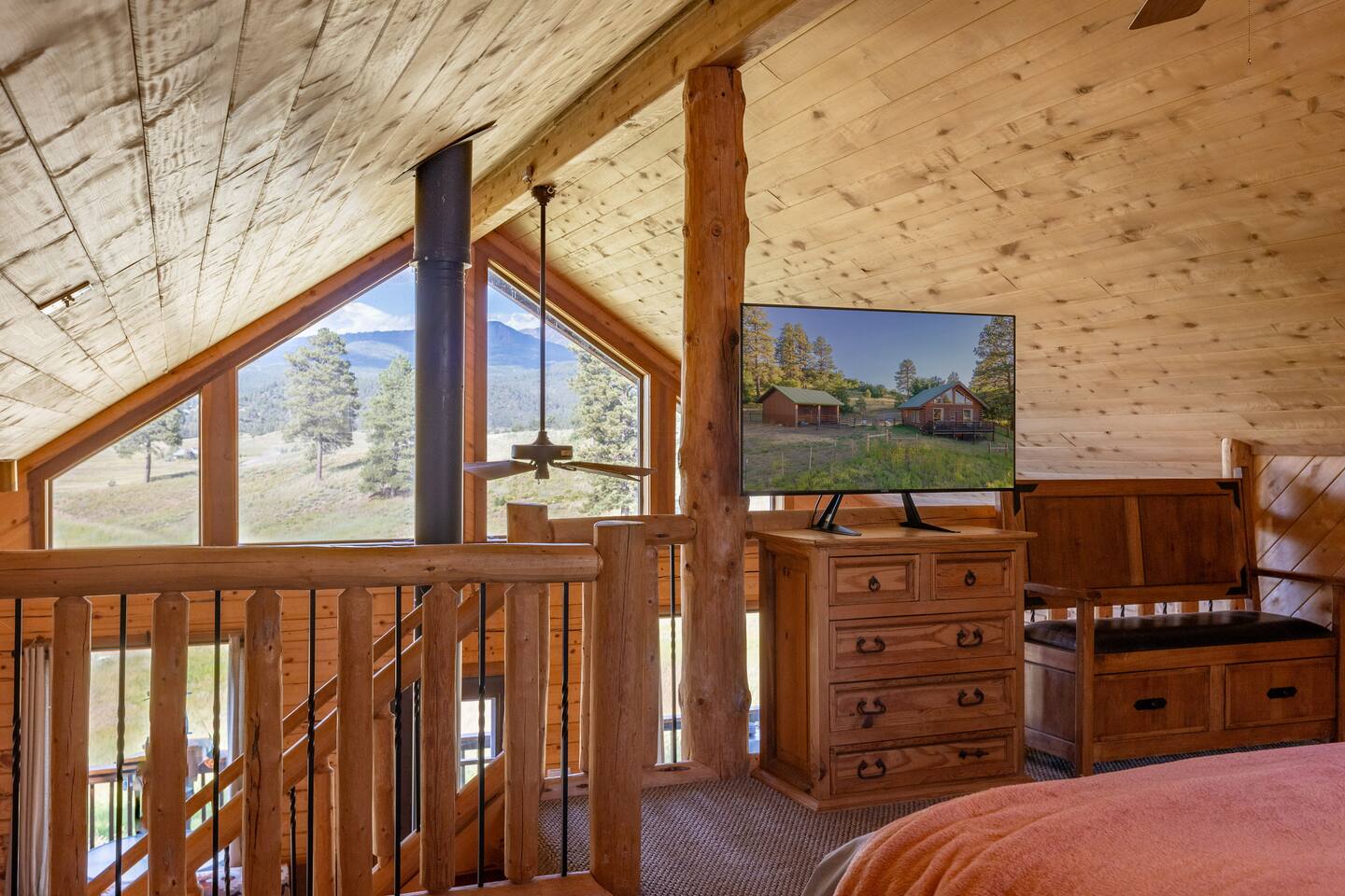 Another spectacular view from the King loft bedroom. From here, its normal to see horses, cattle, elk and the occasional bear! But don't worry. You're all fenced in at Camp Kimberly.