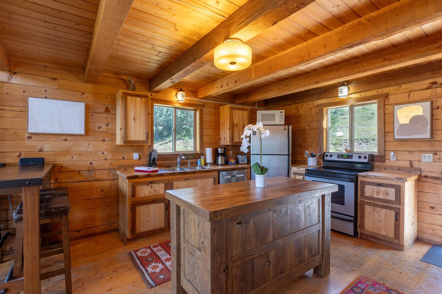 The chef's kitchen is fully-equipped and well stocked to cook meals for your family and friends. All appliances are updated, including the coffee maker. We also keep coffee and creamer stocked for our guests.