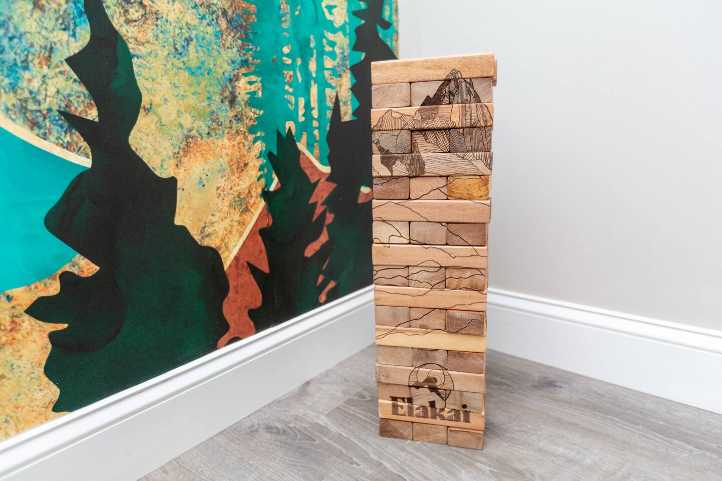 Giant Jenga with a mountain puzzle.