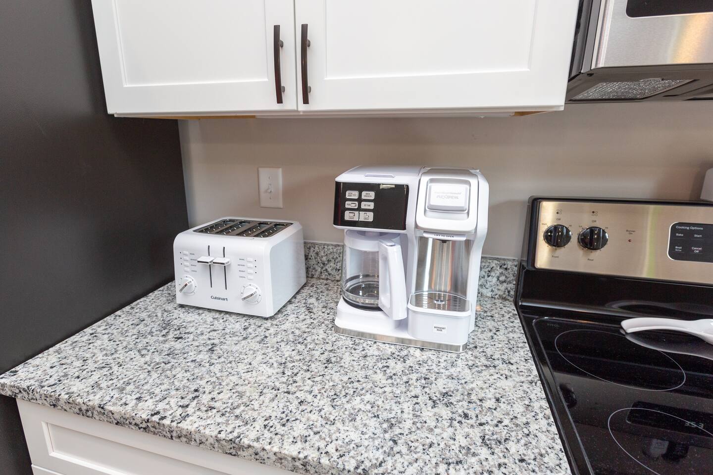 Coffee station. Coffee, creamer, and sugar are provided.