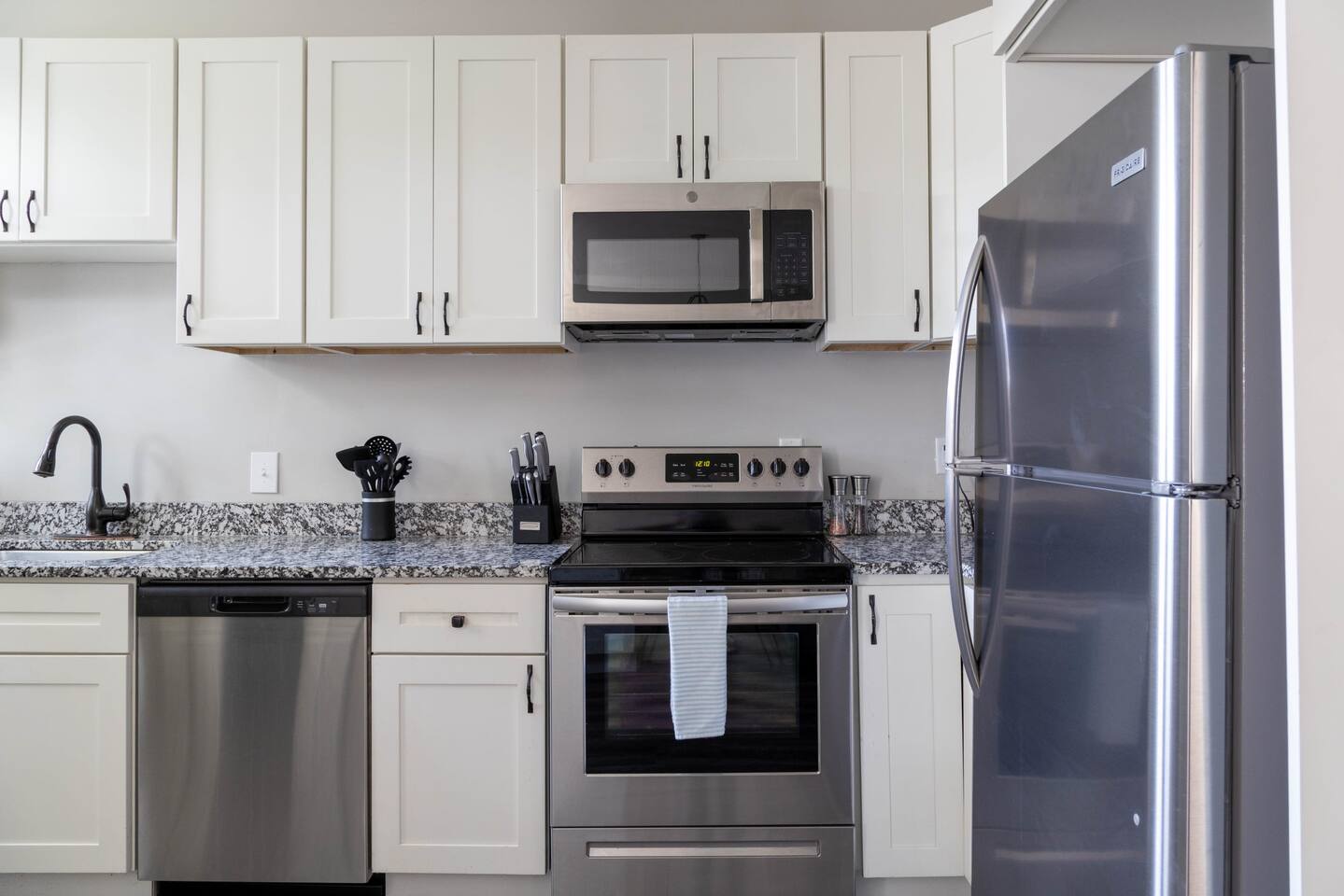 Fully Stocked Kitchen -stainless steel appliances