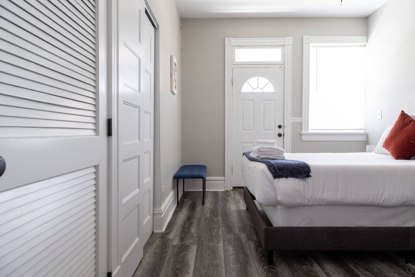 Bedroom #5 - King size bed, closet space and door leading to the balcony