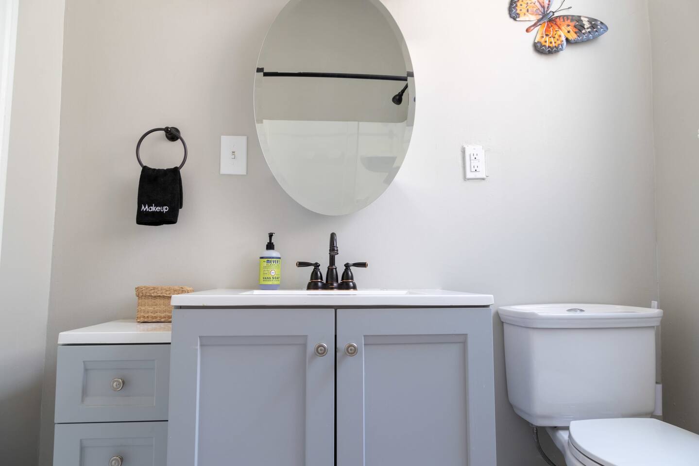 Here's a view of the single vanity in this bathroom, along with fresh, clean towels and toiletries