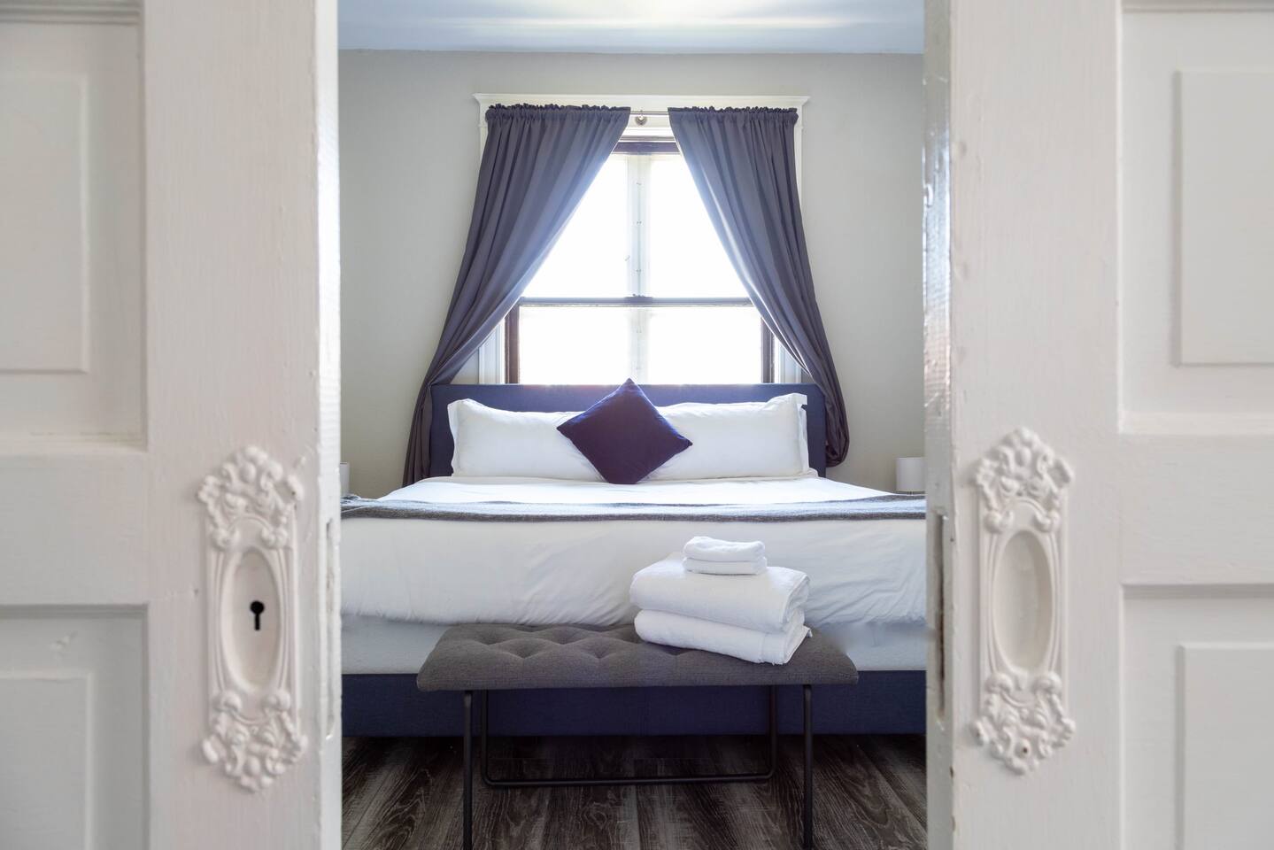 Charming pocket doors between bedrooms for privacy