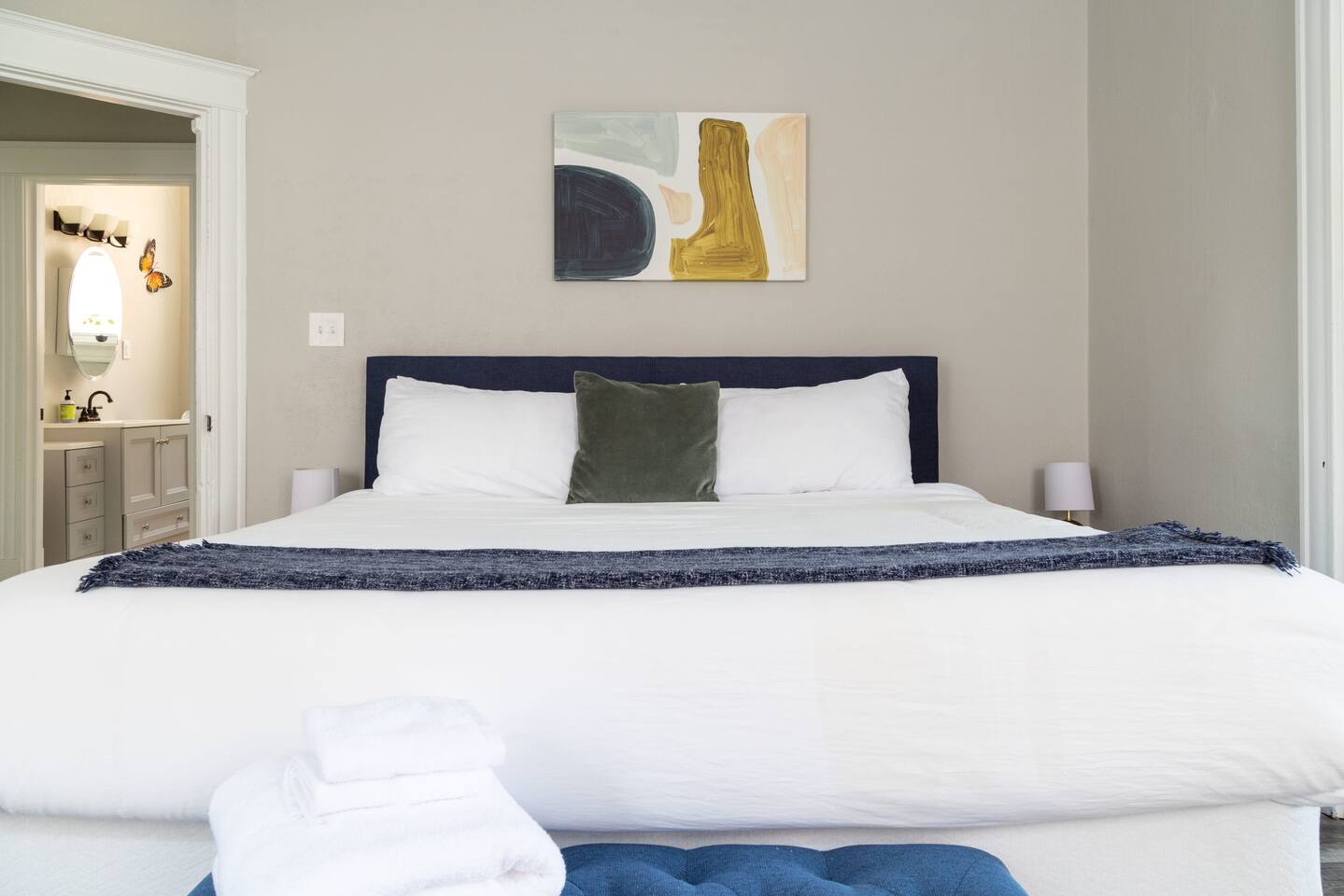 Your comfy bedroom, topped with fresh, clean linens and soft bedding, abundant of natural light