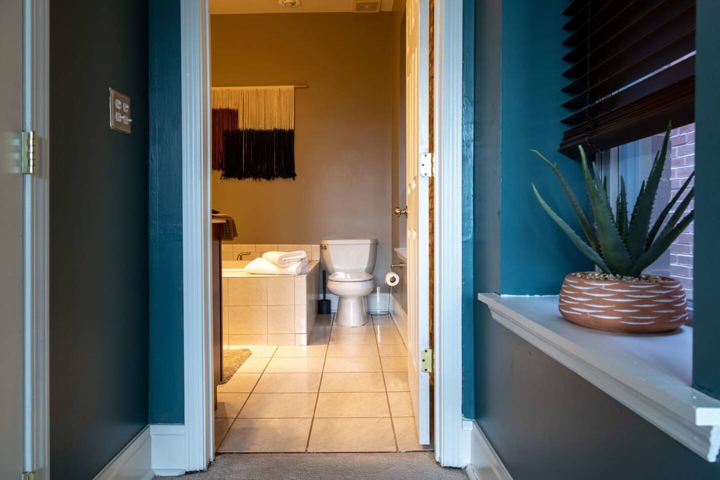 Step into the spacious master bathroom