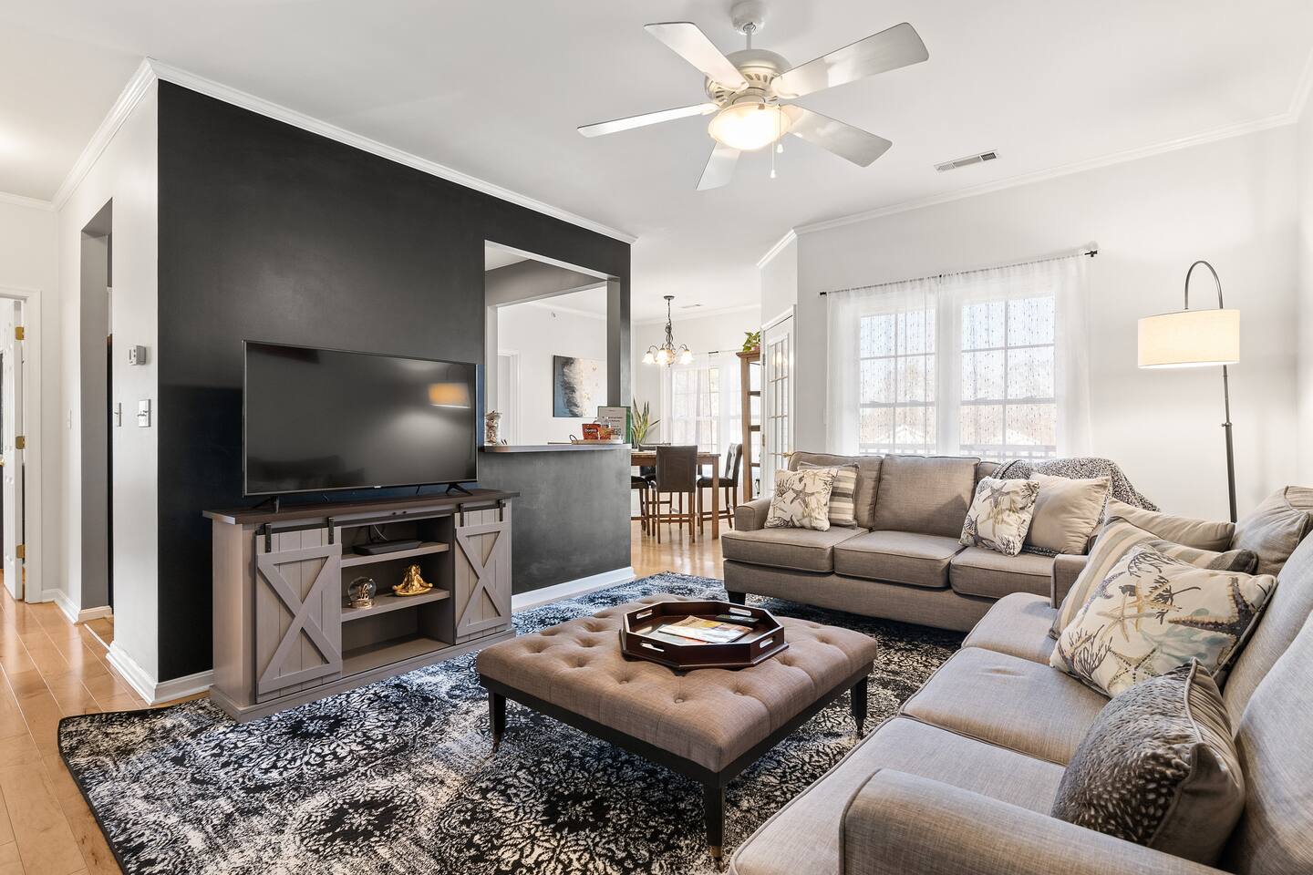 Living room at Cozy Creekwood Condo - Relaxing Getaway - W/ Pool