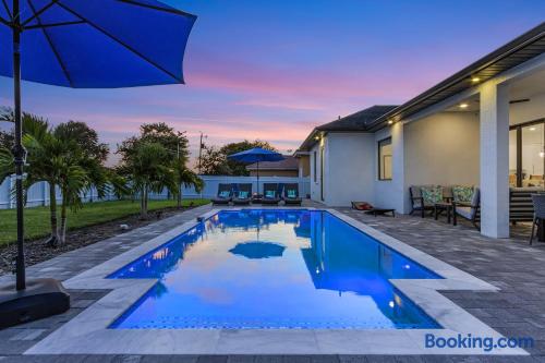 Twilight photo of the private heated pool