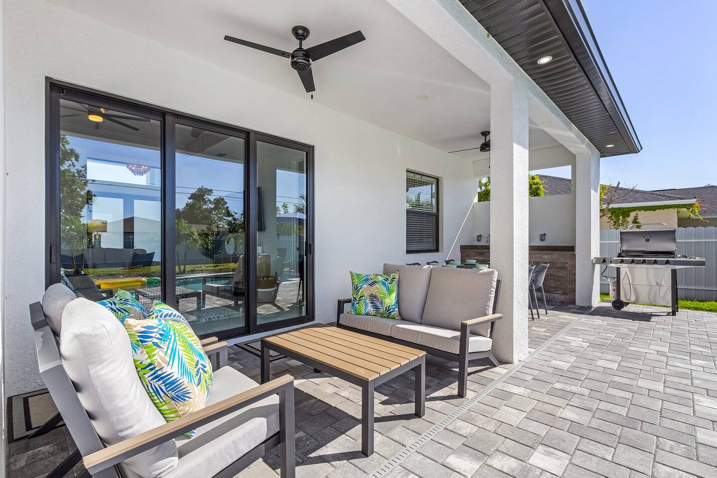 Spacious living area with modern coastal decor