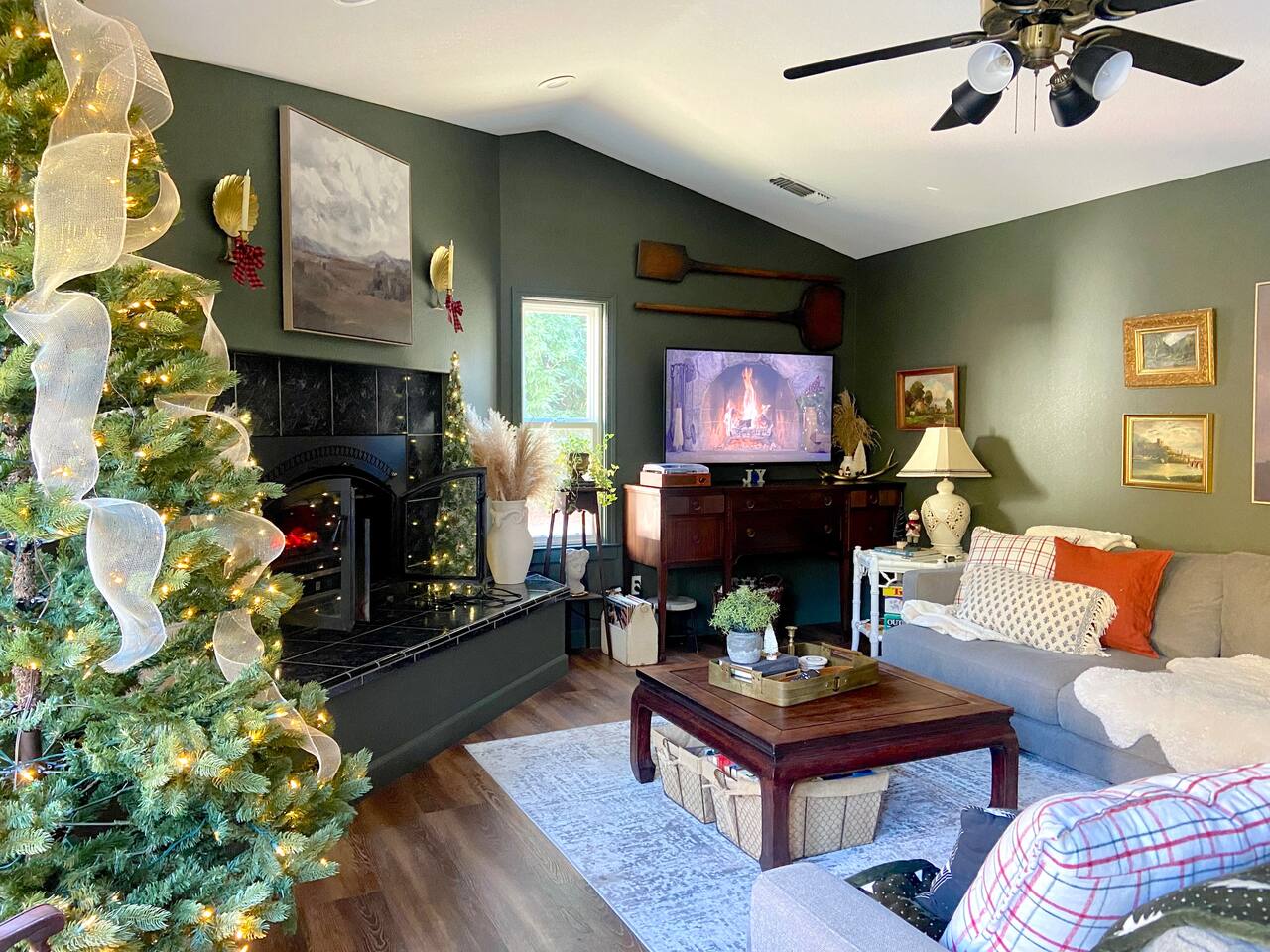 Christmas decor to help our guests enjoy the festivities of the season!  A down filled sectional sofa and a 55" TV.  Baskets filled with books under the coffee table & board games for the whole family.