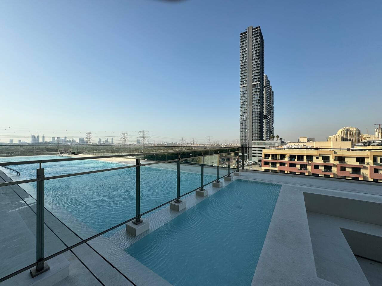 ASHRI Luxe Apt in JVC I Amazing Pools I Smart Home