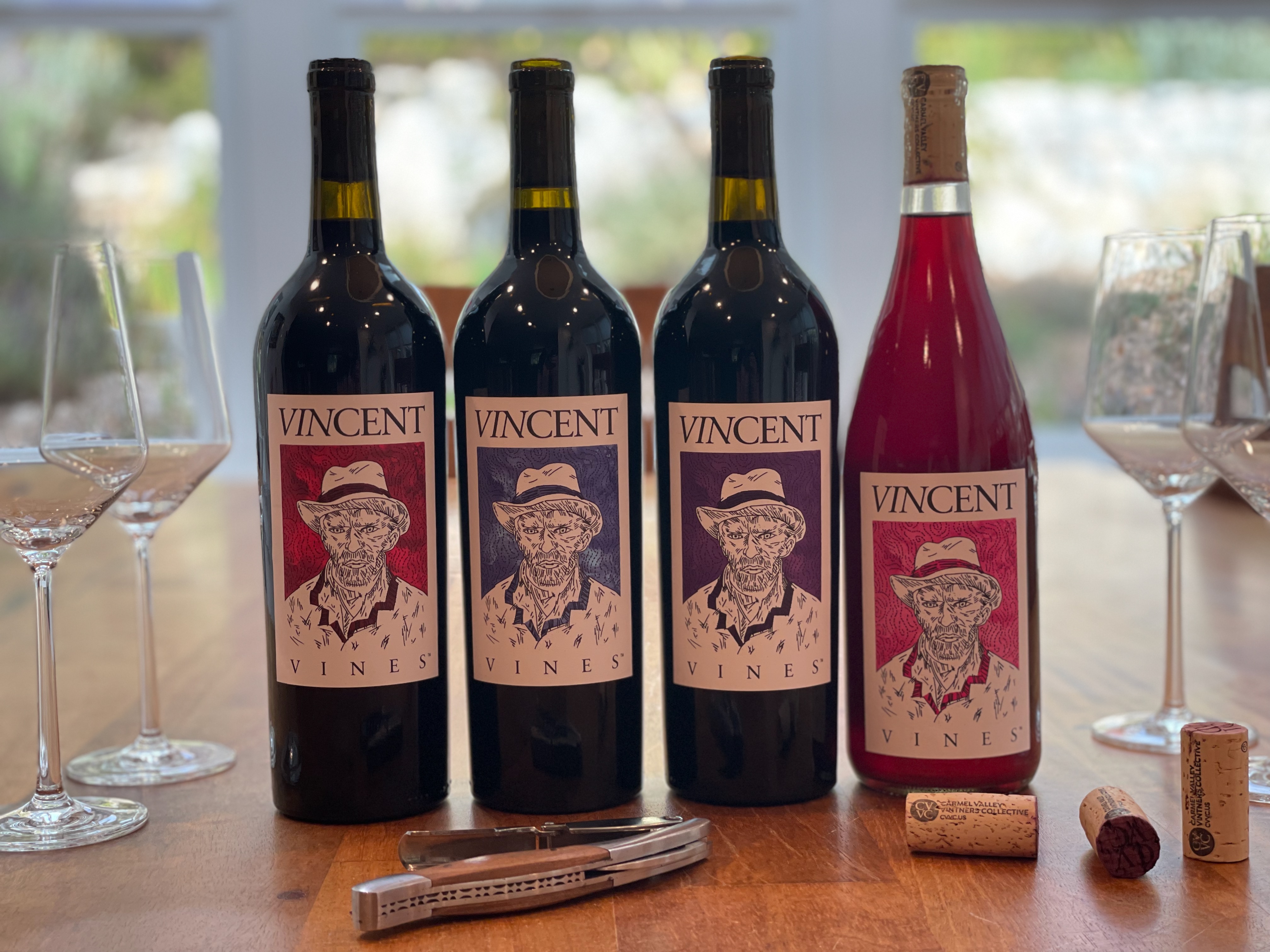 Our VINCENT VINES Estate Merlot, grown in the on-site vineyard, along with our Cabernet Sauvignon, Petite Sirah, and Rosé of Petite Sirah from neighboring vineyards. Guests 21+ can buy bottles from our self-service wine fridge in the garage.