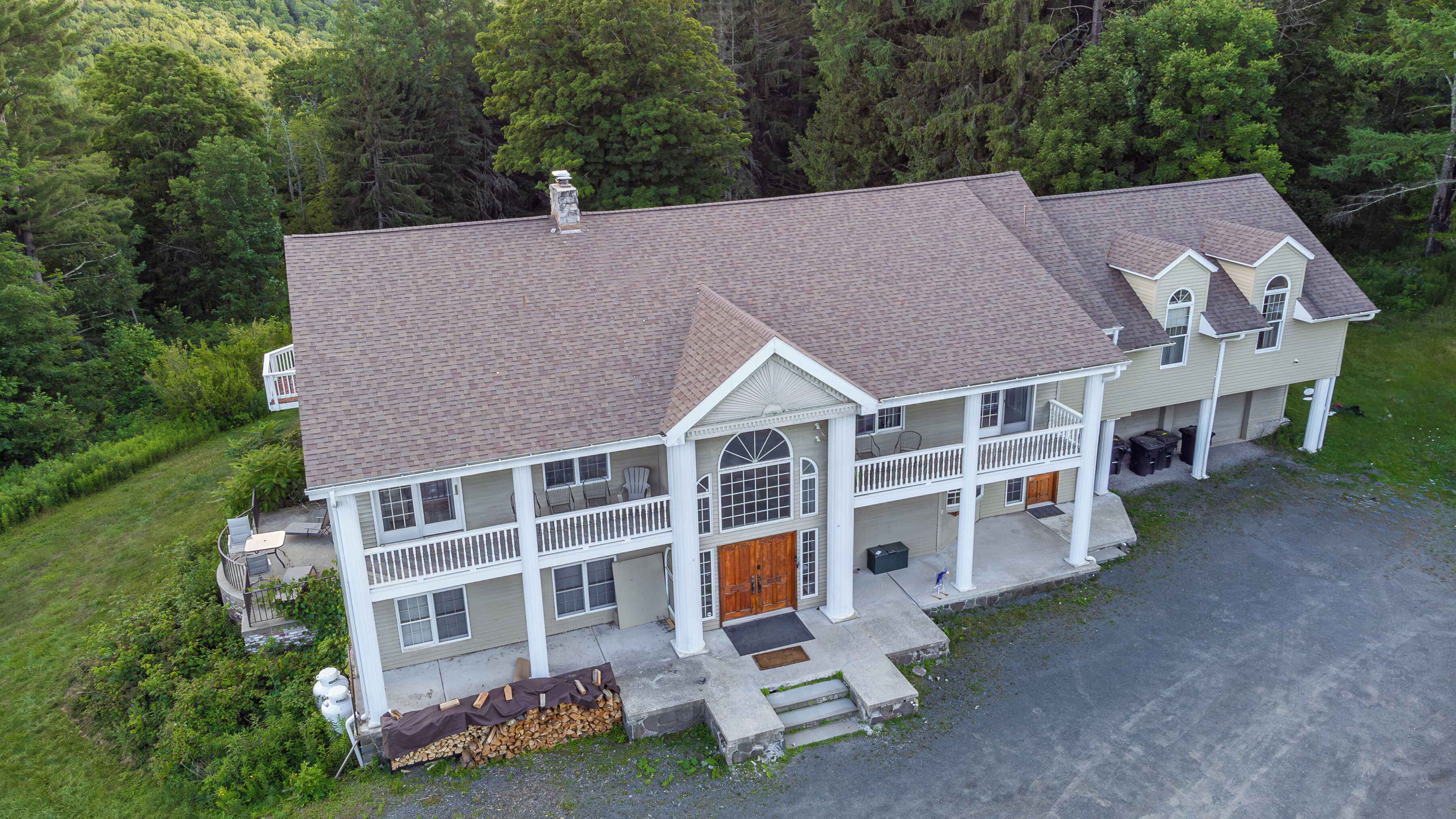 Spacious lodge-style retreat with balconies and serene forest surroundings