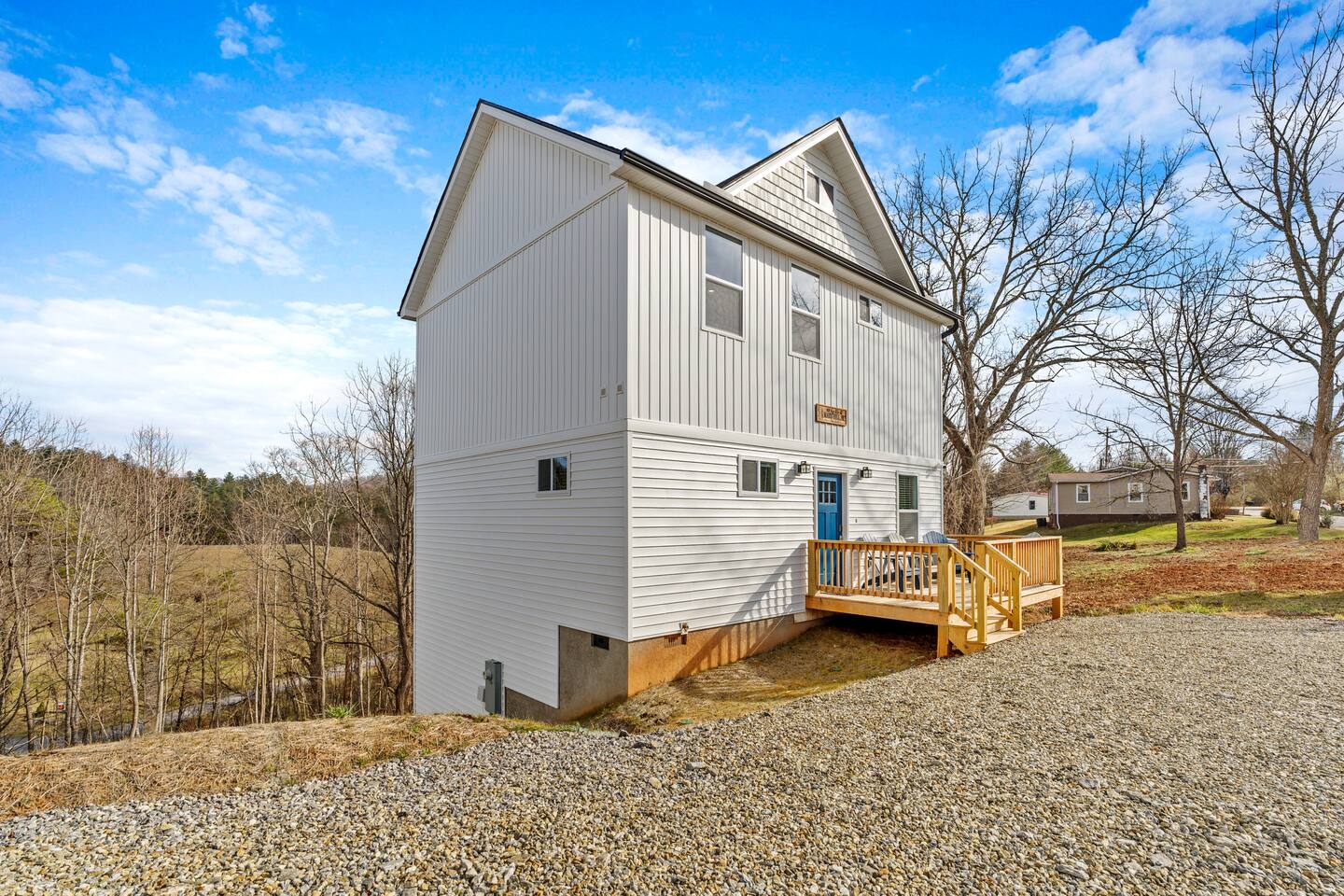 Front porch with seating. Plenty of parking for 4-5 vehicles.