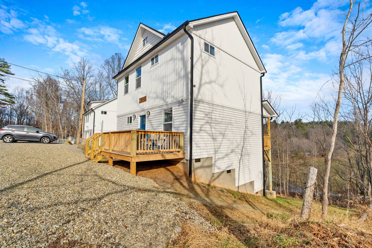 Front porch with seating. Plenty of parking for 4-5 vehicles.