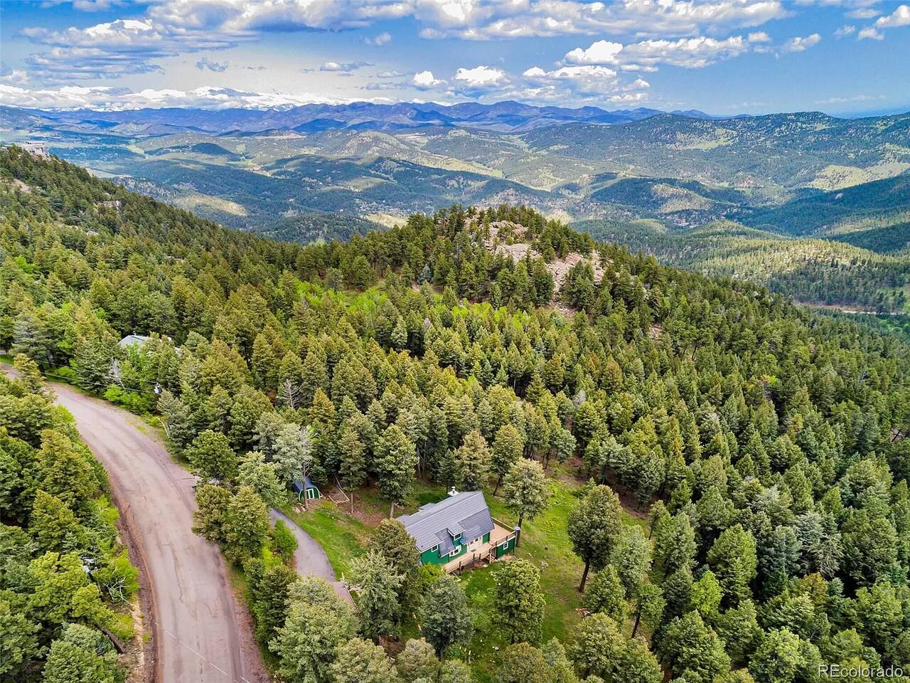 Aerial view of the forested foothills around the property
