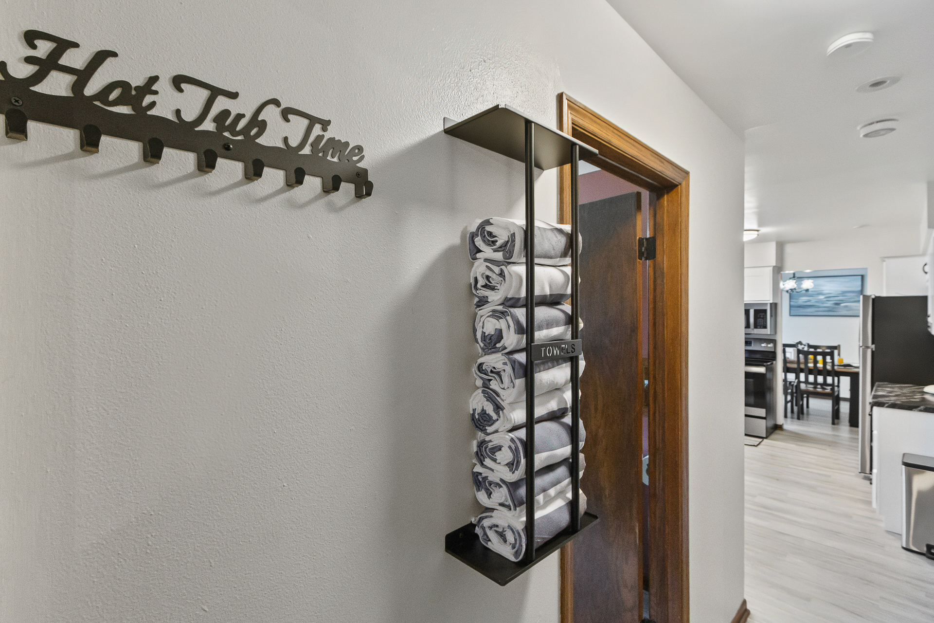 Hot tub towel station with easy access to the kitchen and living areas