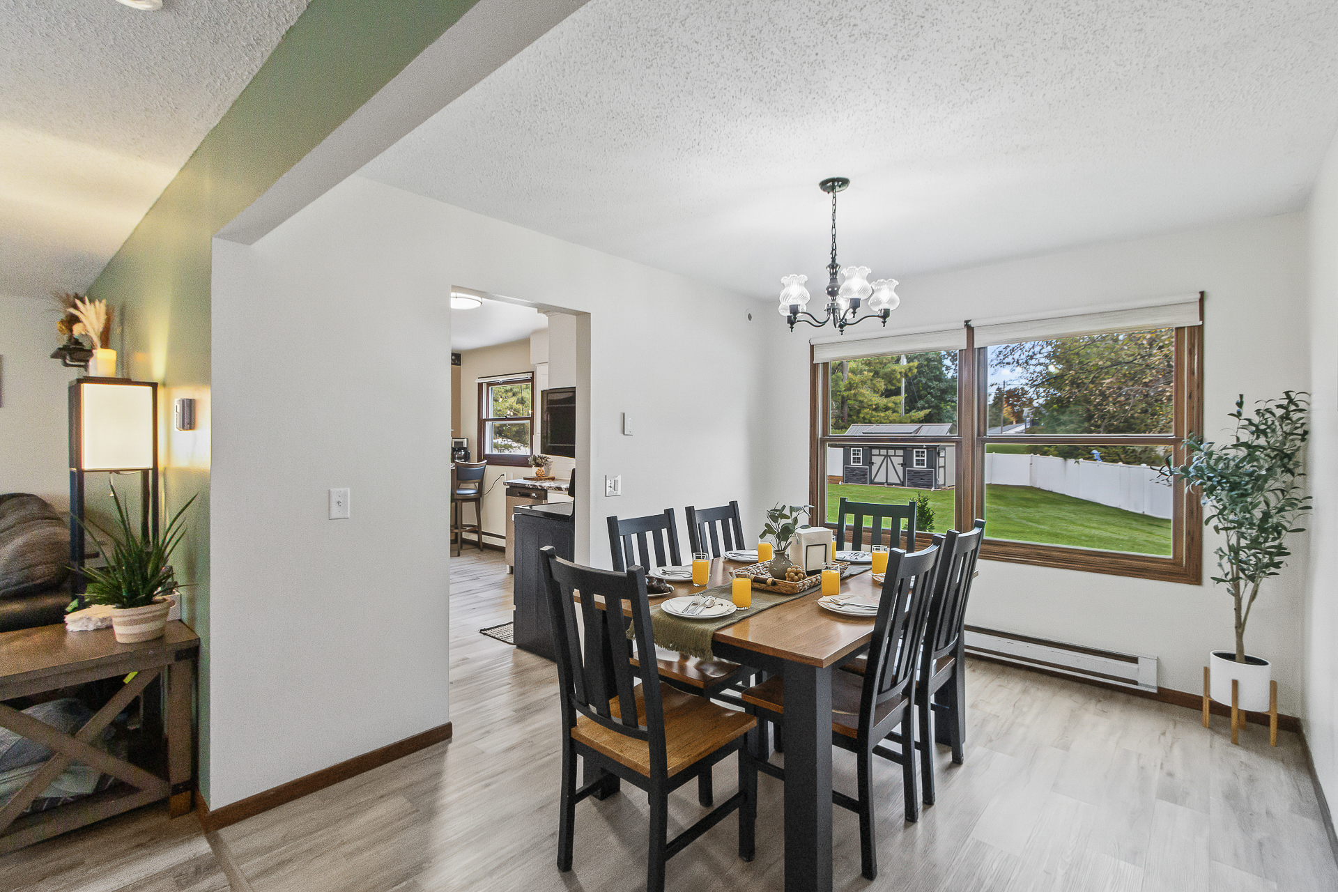 Bright dining room for 6 with backyard views and easy kitchen access