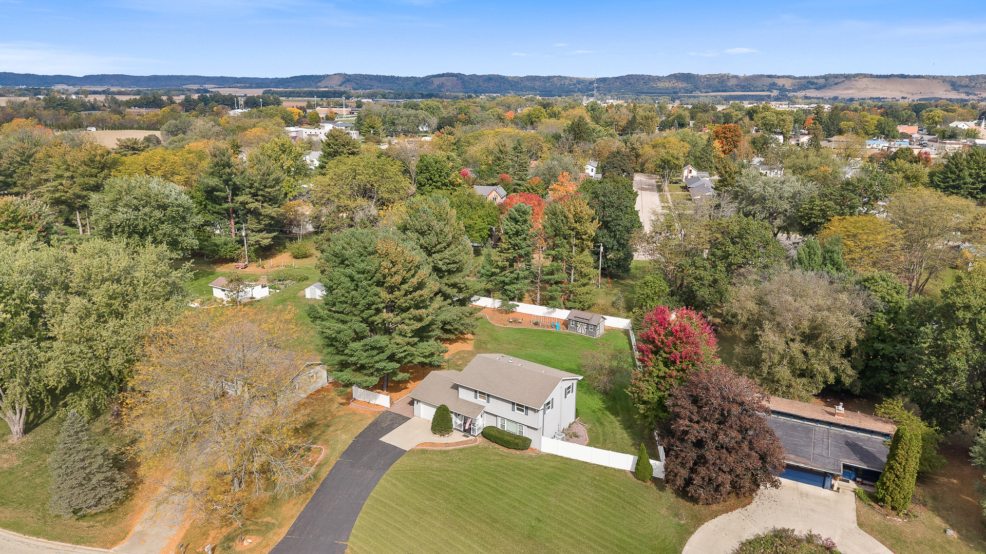 Spacious home on a large lot with scenic views and mature trees