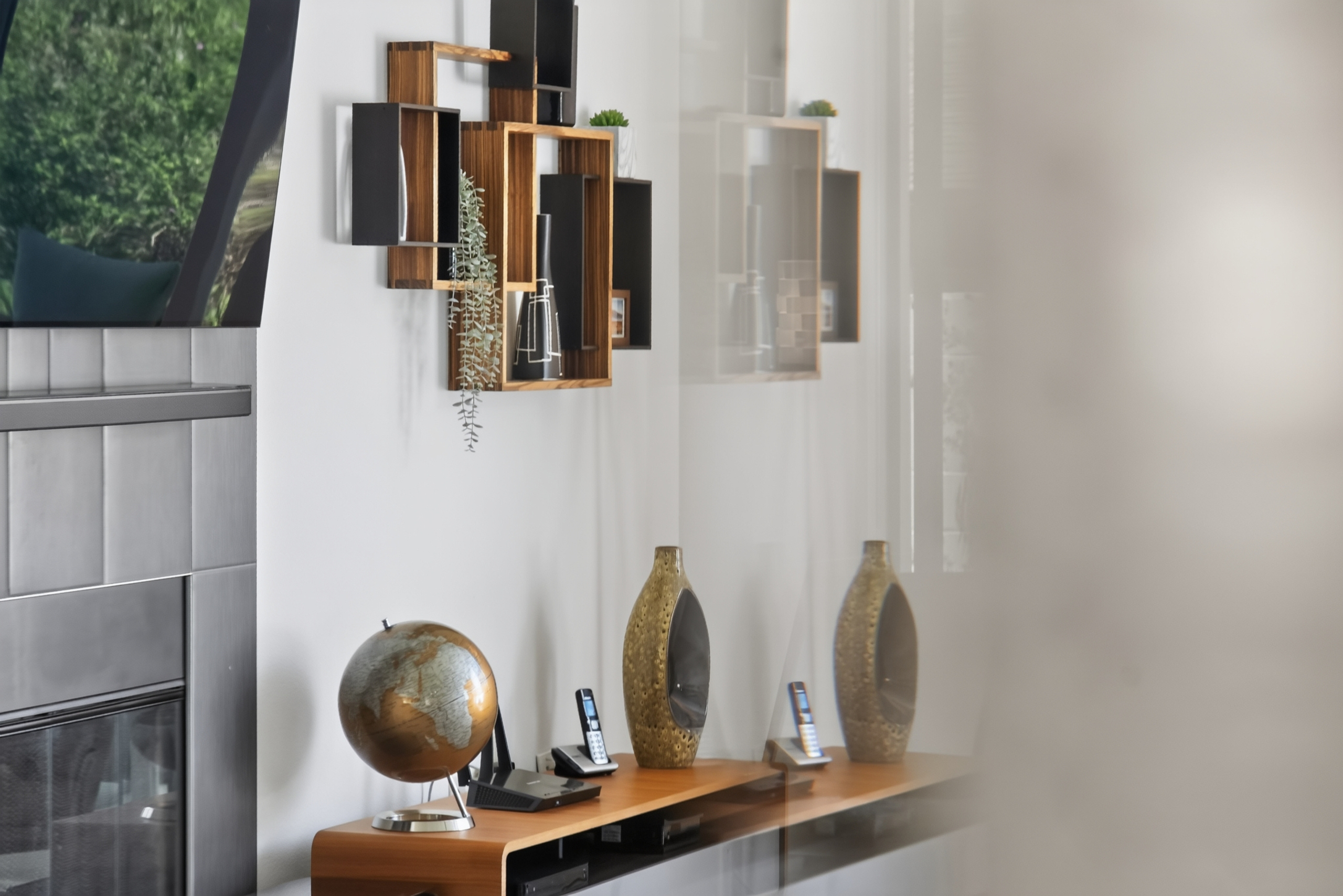 Stylish modern lounge details with fireplace and designer decor