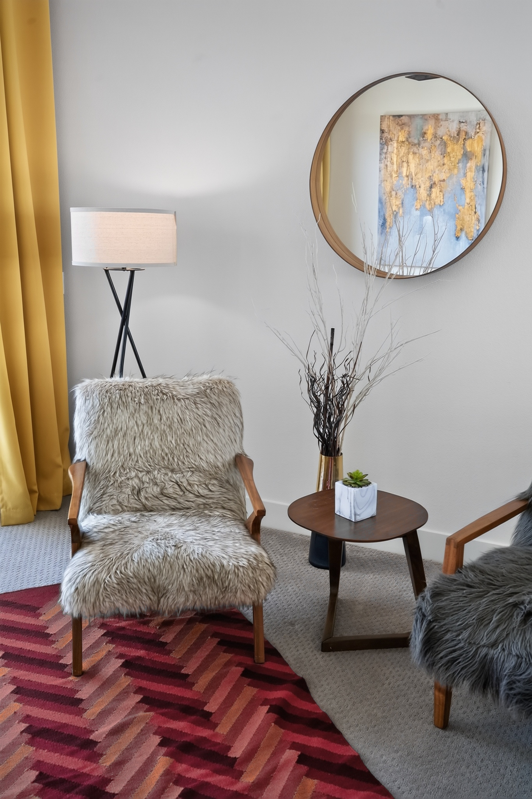 Cozy designer seating nook with plush chairs and warm modern accents