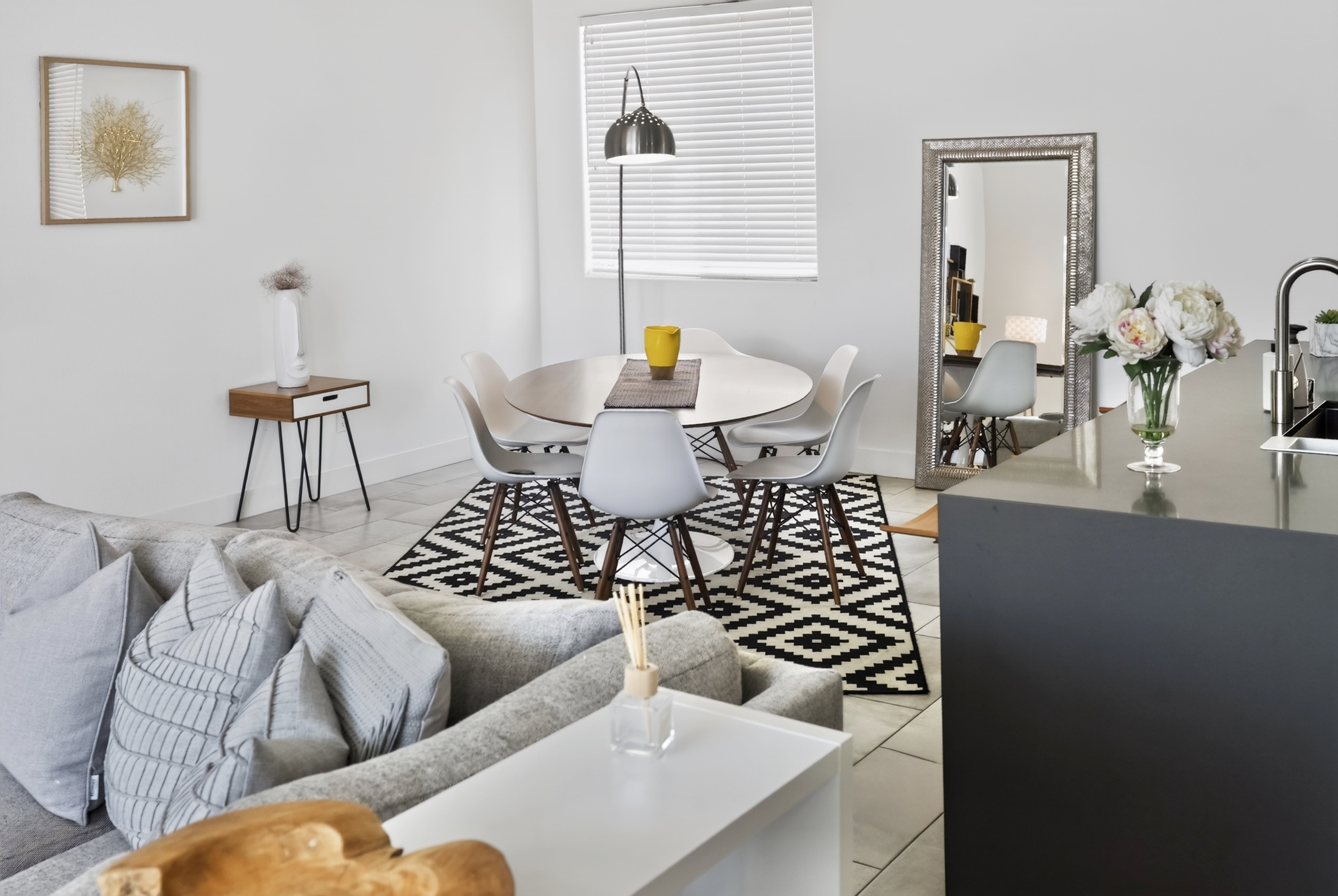 Bright modern dining nook with stylish decor and open-concept flow