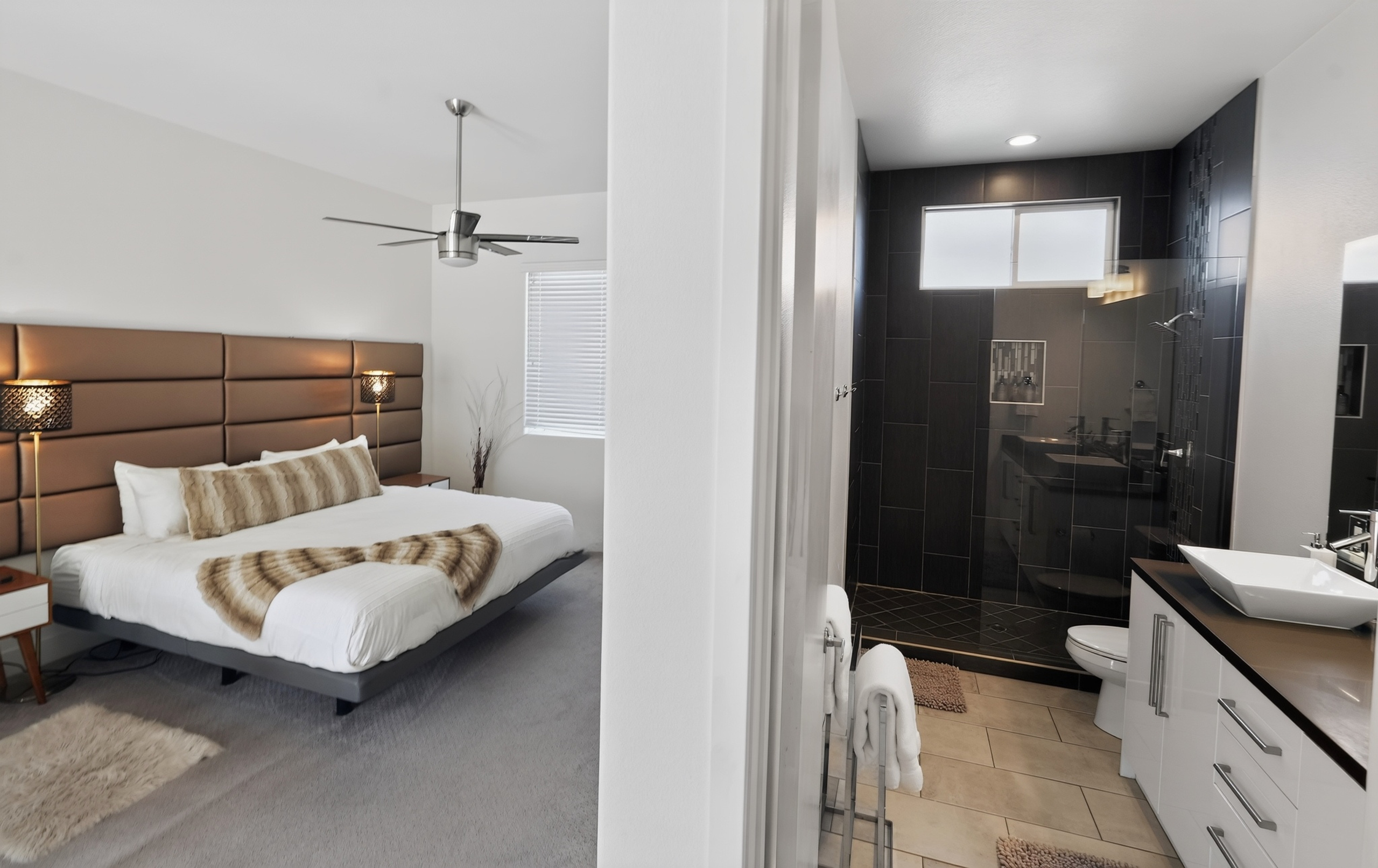 Spacious king suite with sleek ensuite bath and walk-in glass shower