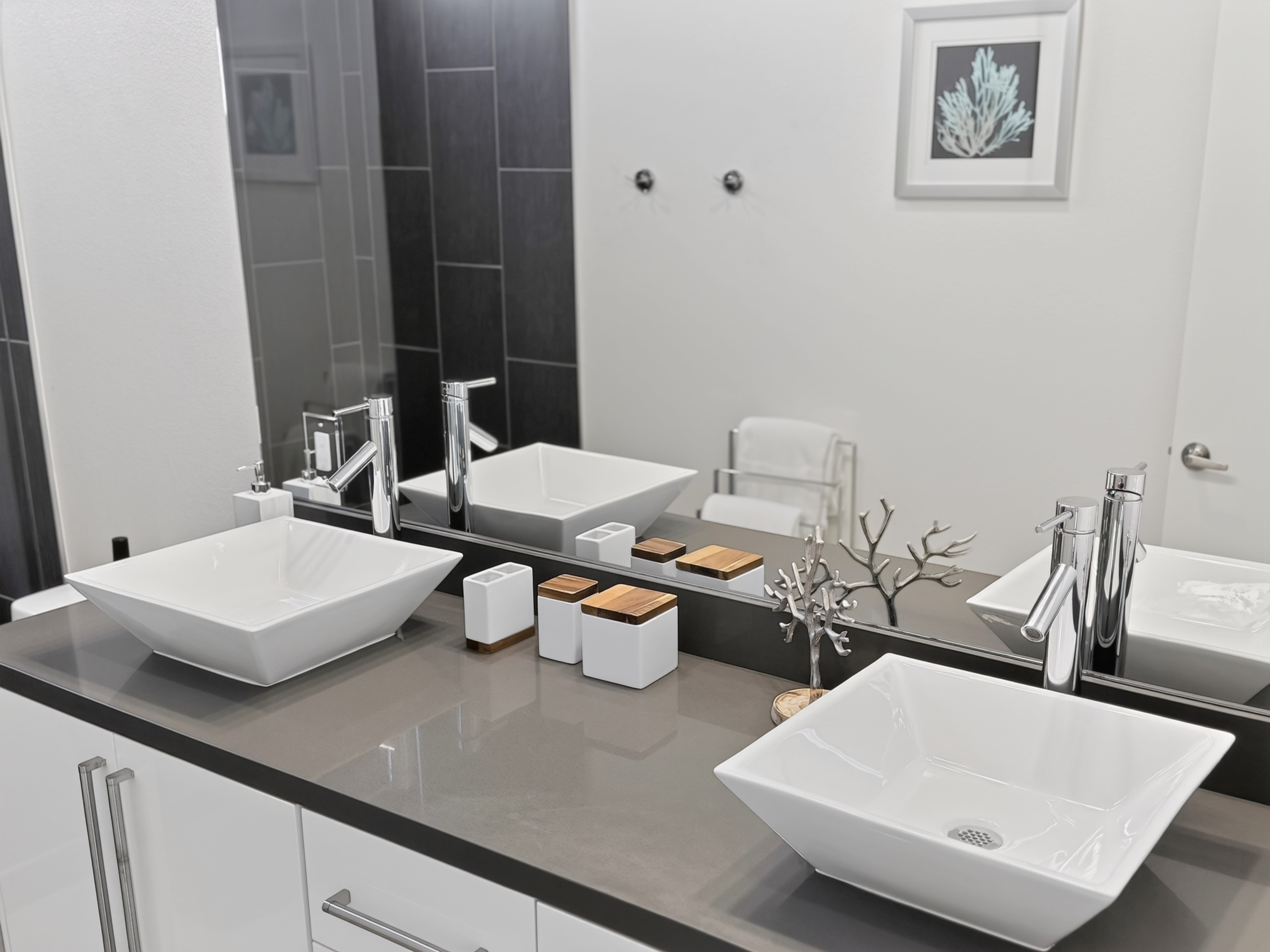 Modern double vanity bathroom with stylish vessel sinks and spa-like design