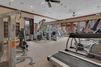 Access a fully equipped gym featuring treadmills, ellipticals, weight machines, and free weights. A bright, spacious area with ceiling fans and large windows helps you maintain your routine while traveling! Stay fit on your vacation!