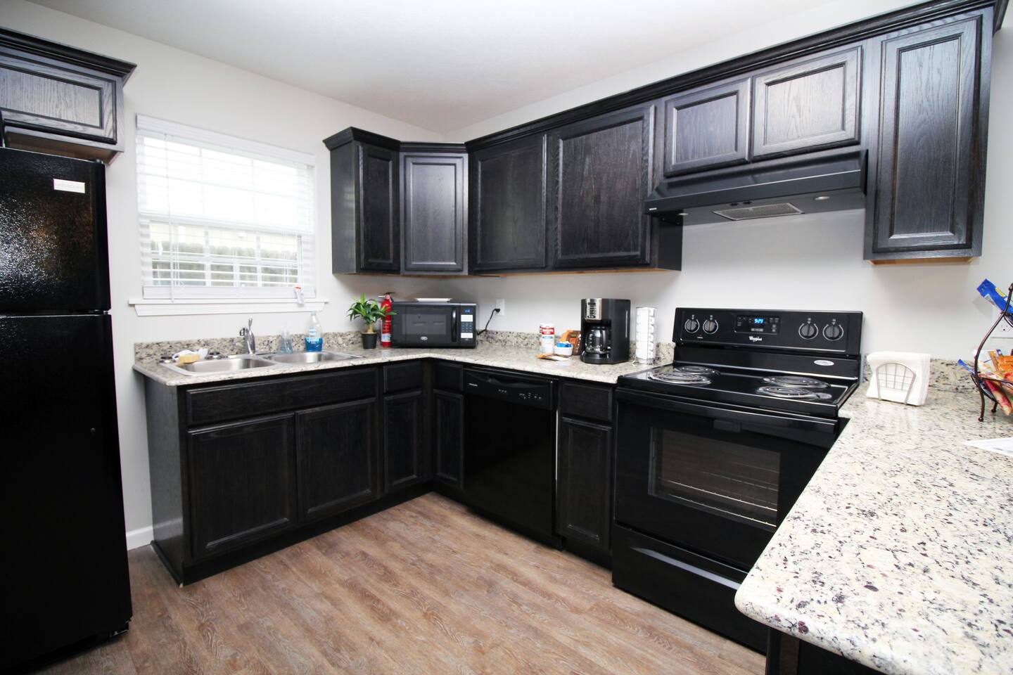 Great modern kitchen with granite countertops and soft-close cabinets.