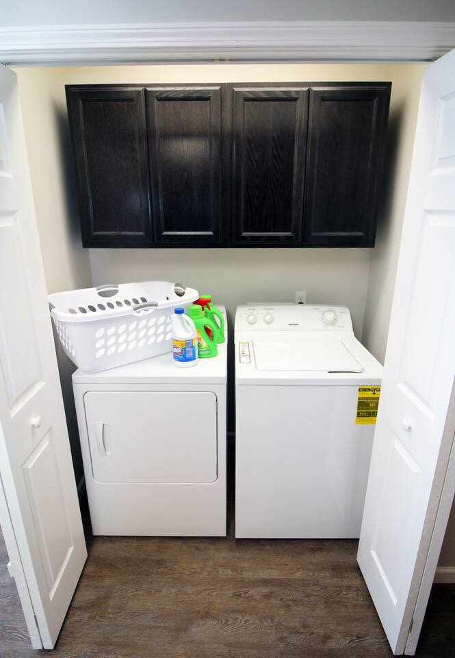 Washer and dryer with supplies