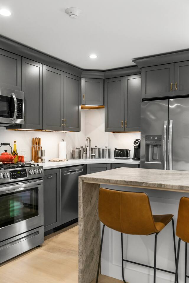 Stylish + Modern Central Ptown Condo + EV Charger