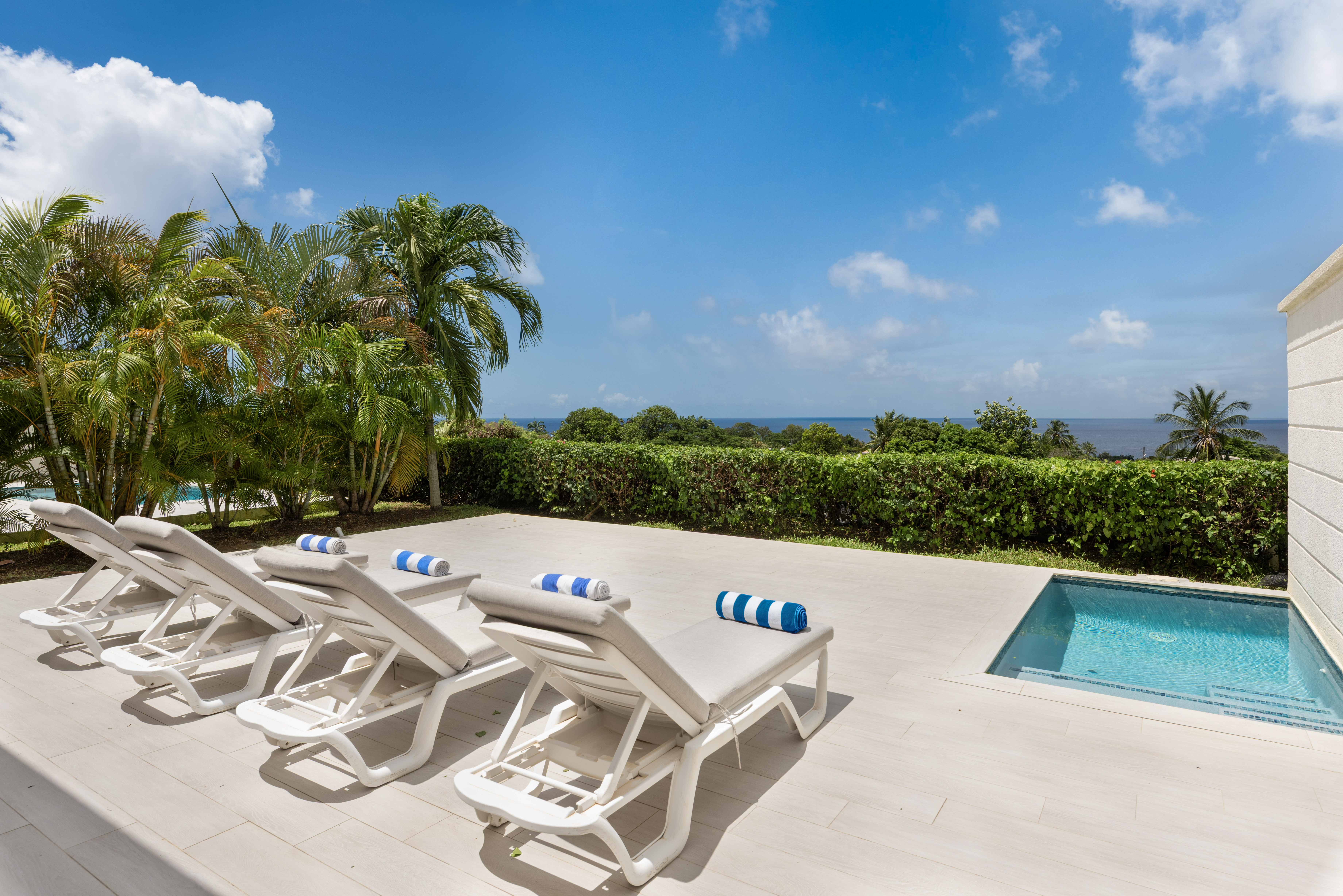 Private sun deck with plunge pool and tropical ocean-view setting