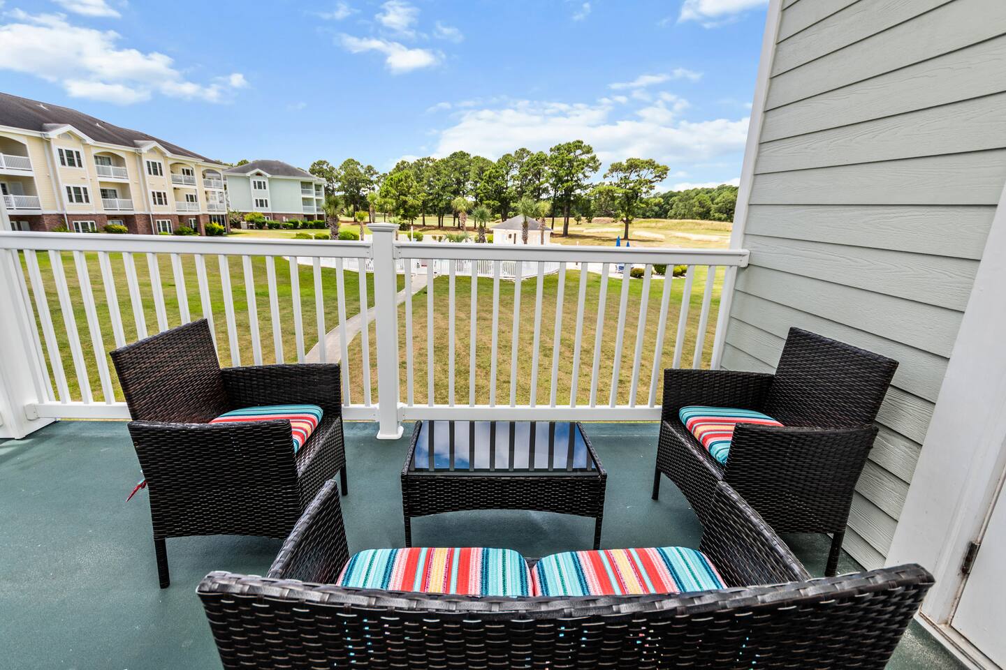 Pool view at Myrtlewood. Quick drive to the beach!