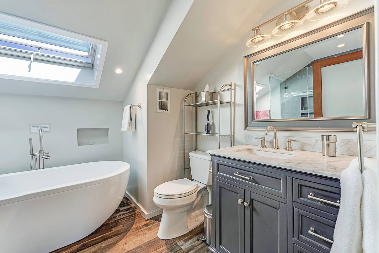 The elegant vanity cabinet adds a touch of sophistication, making your routine a refreshing and stylish experience.