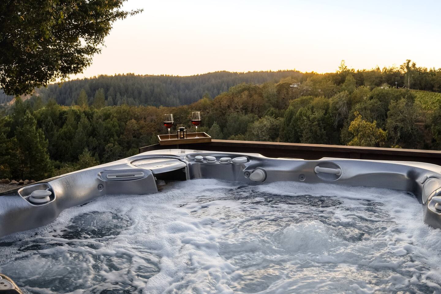 Soak in serenity—Let the warm bubbles melt your stress away as you gaze over the peaceful hills and vineyards below.