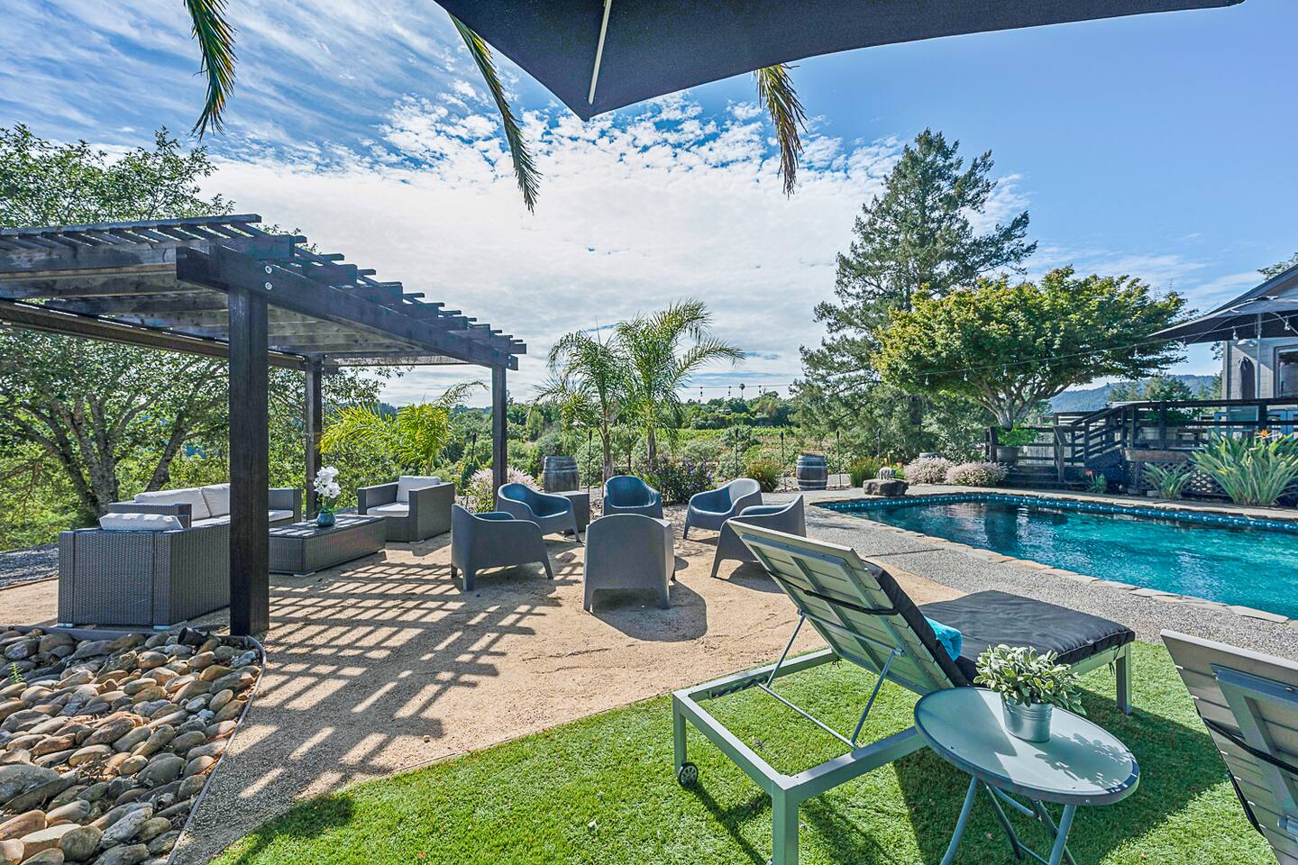 Feel the sun on your skin as you lounge by the pool with close friends, enjoying cool drinks and the peaceful sounds of nature surrounding you.