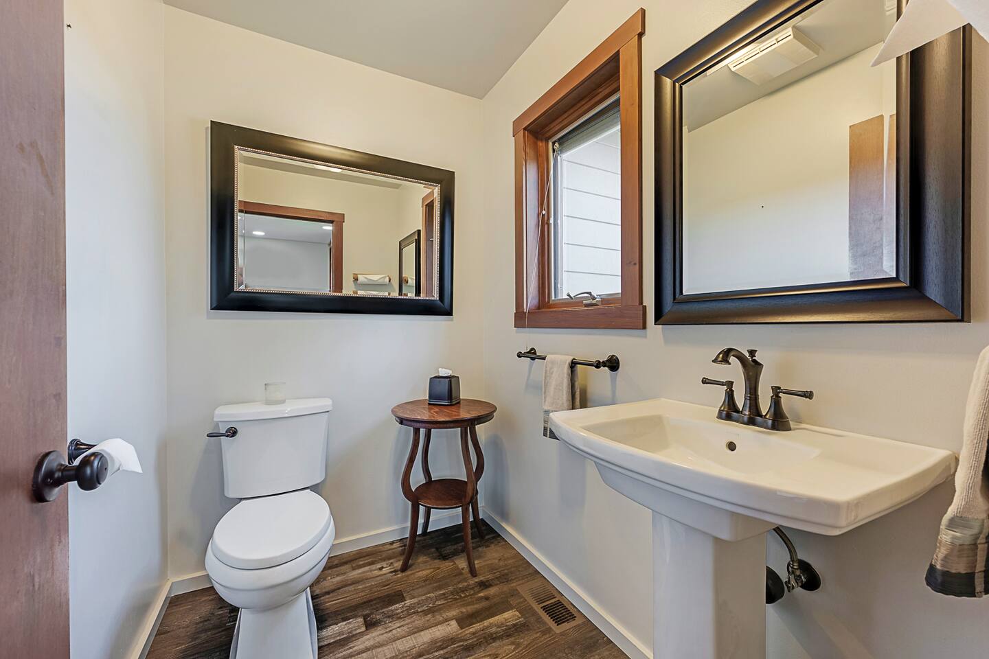 The attached bathroom in the den offers privacy and convenience, ensuring a seamless experience whether you're relaxing or having fun with friends and family over pool or ping pong. A perfect blend of function and comfort. 