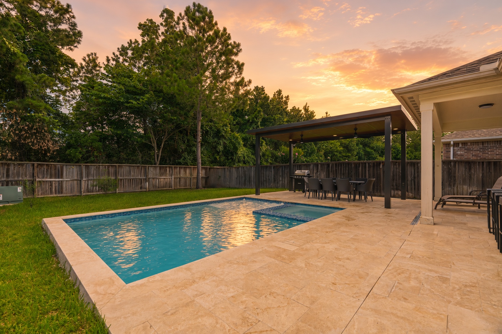 Private pool, spa & covered outdoor dining at sunset