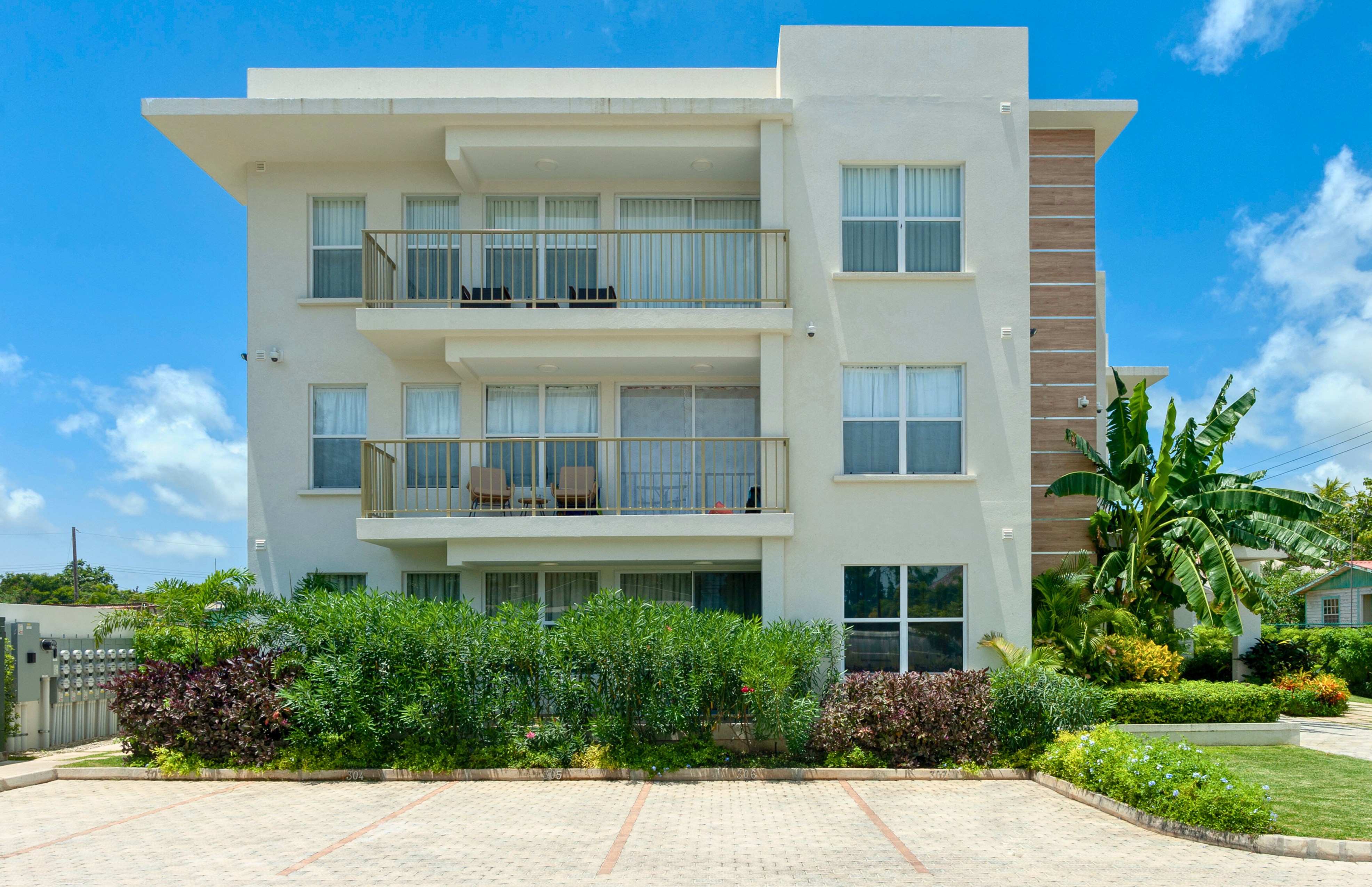 Modern tropical condo with private balconies and convenient parking